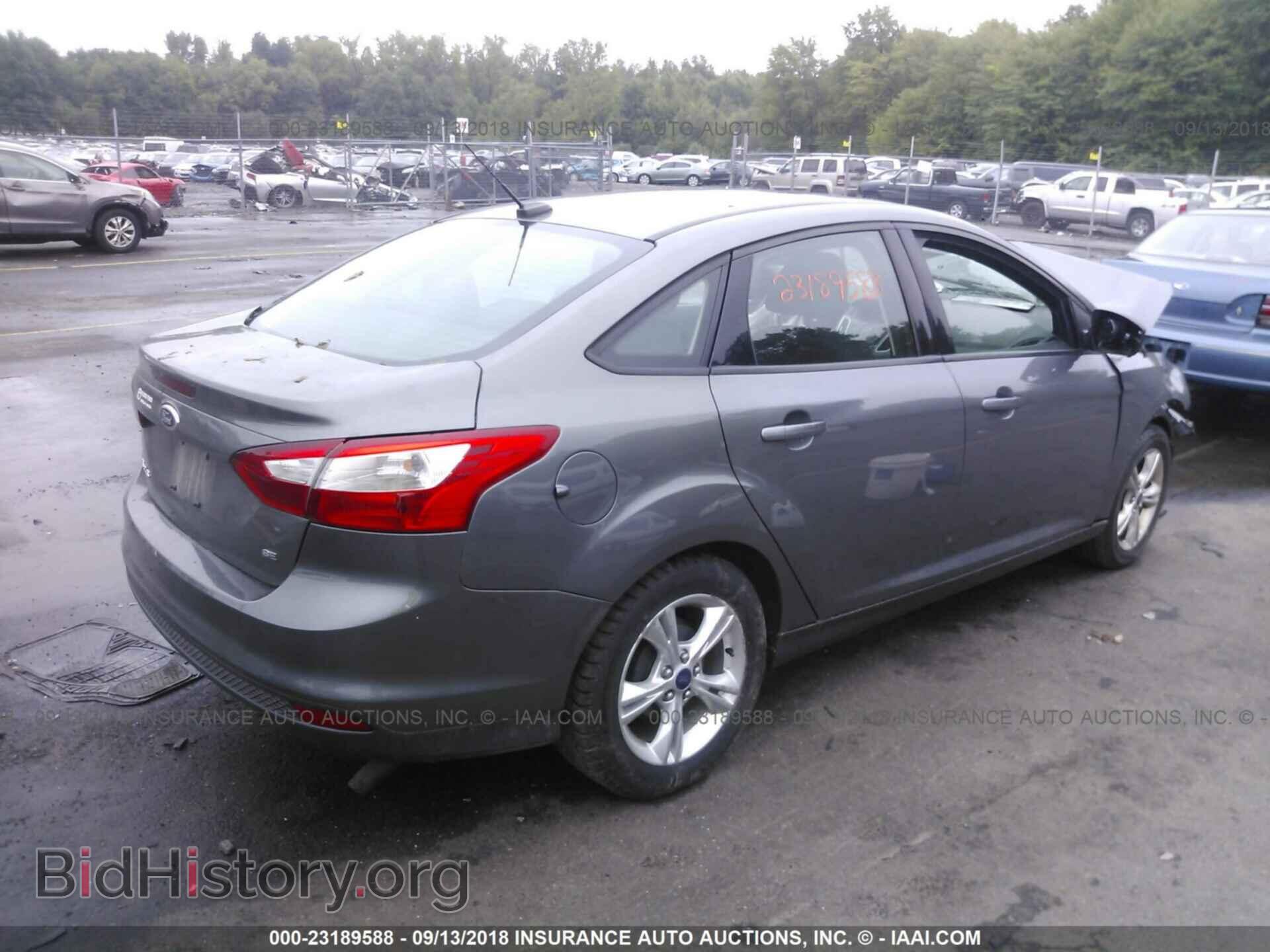 2014 Ford Focus - VIN: 1FADP3F24EL178206 - Фото 4