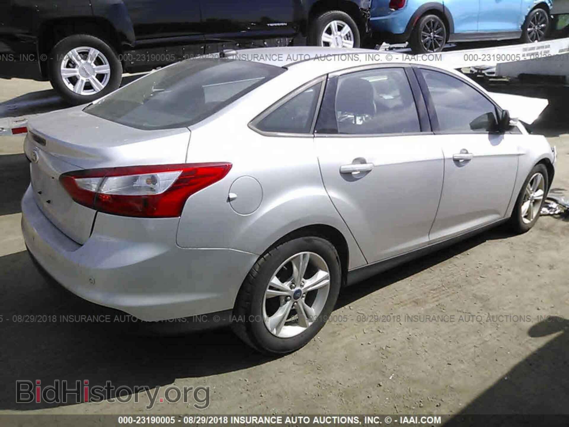 2014 Ford Focus - VIN: 1FADP3F21EL377374 - Фото 4