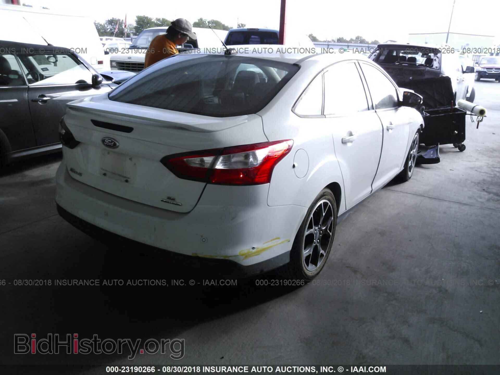 2013 Ford Focus - VIN: 1FADP3F25DL112164 - Фото 4