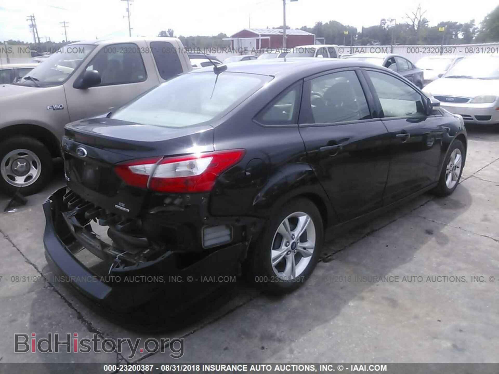 2014 Ford Focus - VIN: 1FADP3F20EL109948 - Фото 4