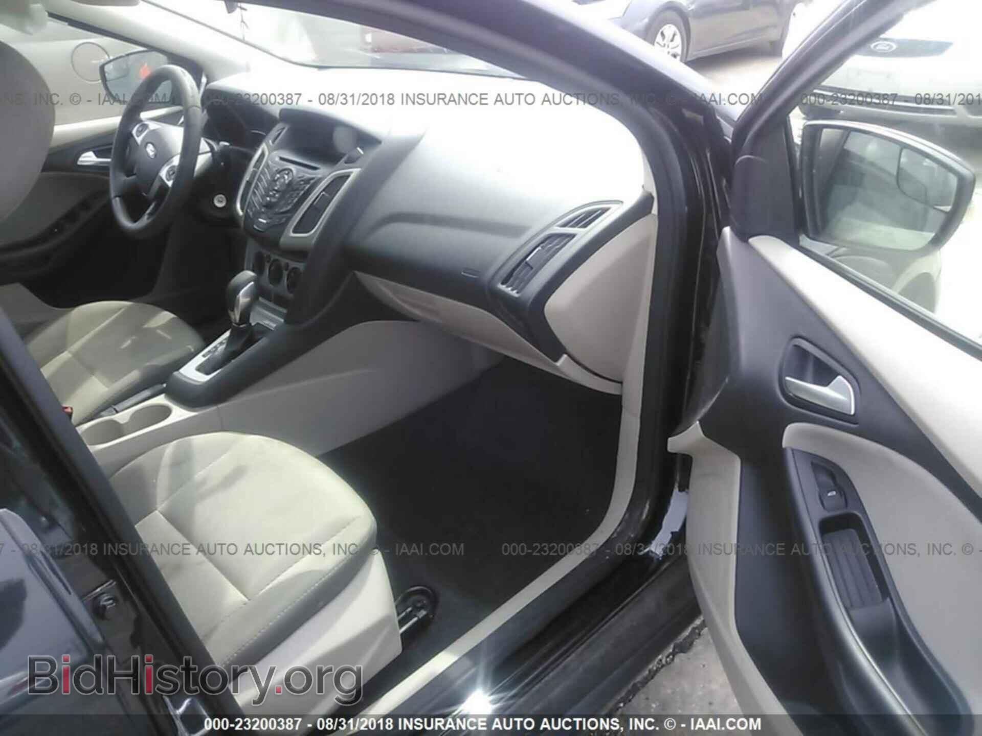 2014 Ford Focus - VIN: 1FADP3F20EL109948 - Фото 5
