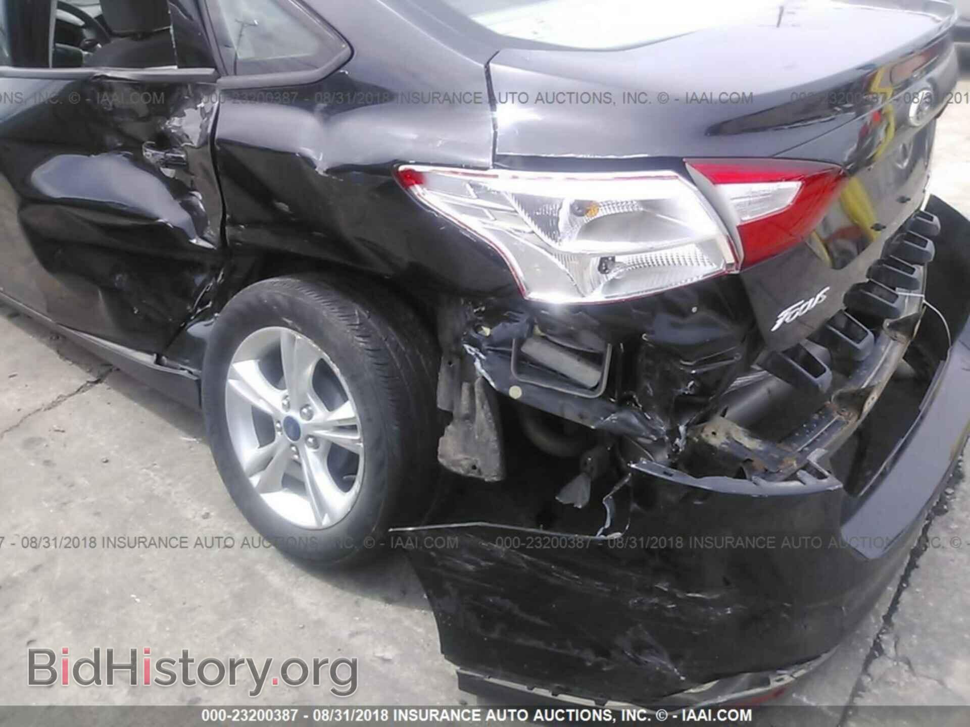 2014 Ford Focus - VIN: 1FADP3F20EL109948 - Фото 6