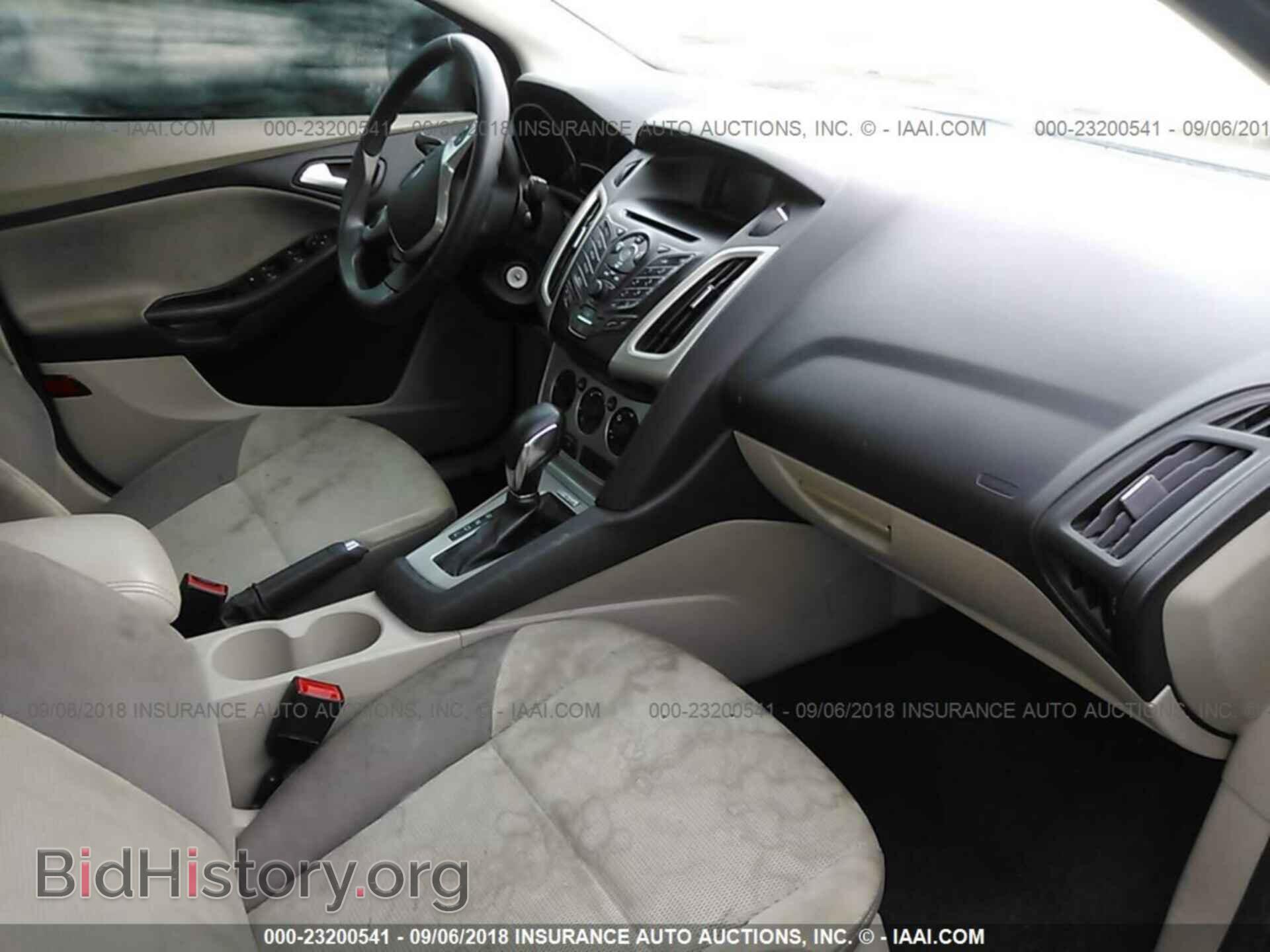 2014 Ford Focus - VIN: 1FADP3F29EL321182 - Фото 5
