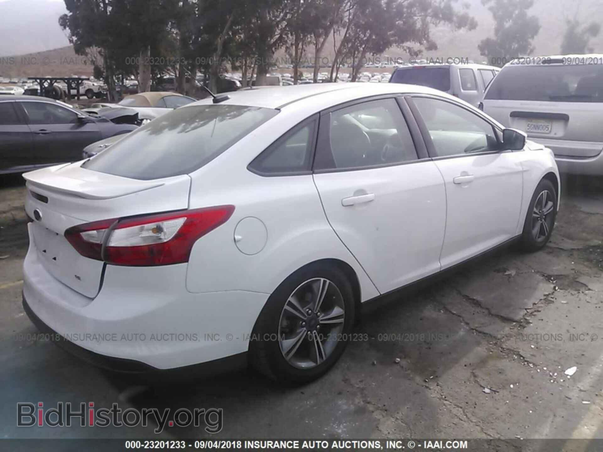 2014 Ford Focus - VIN: 1FADP3F23EL240954 - Фото 4