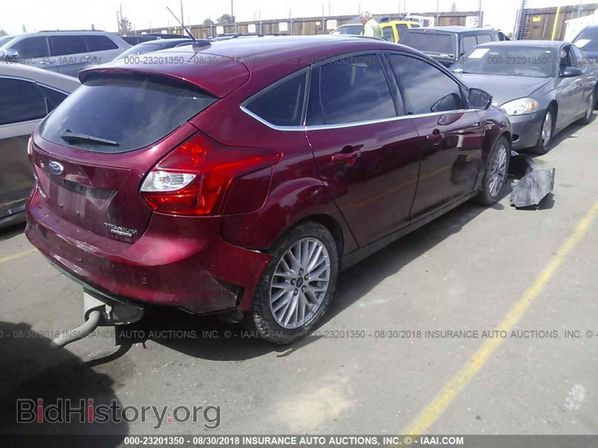 2014 Ford Focus - VIN: 1FADP3N27EL463354 - Photo 4