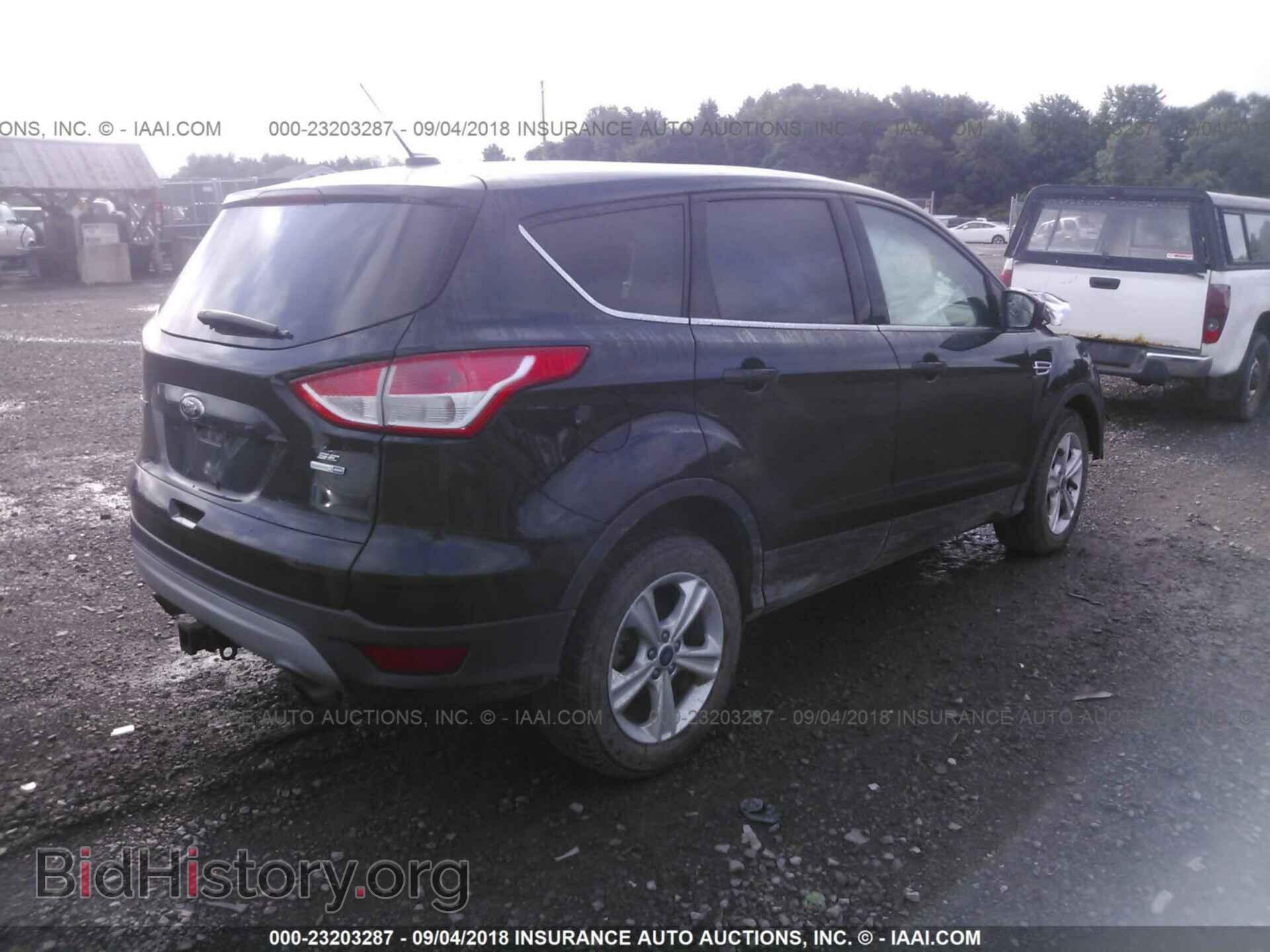 2014 Ford Escape - VIN: 1FMCU9G96EUC14657 - Фото 4
