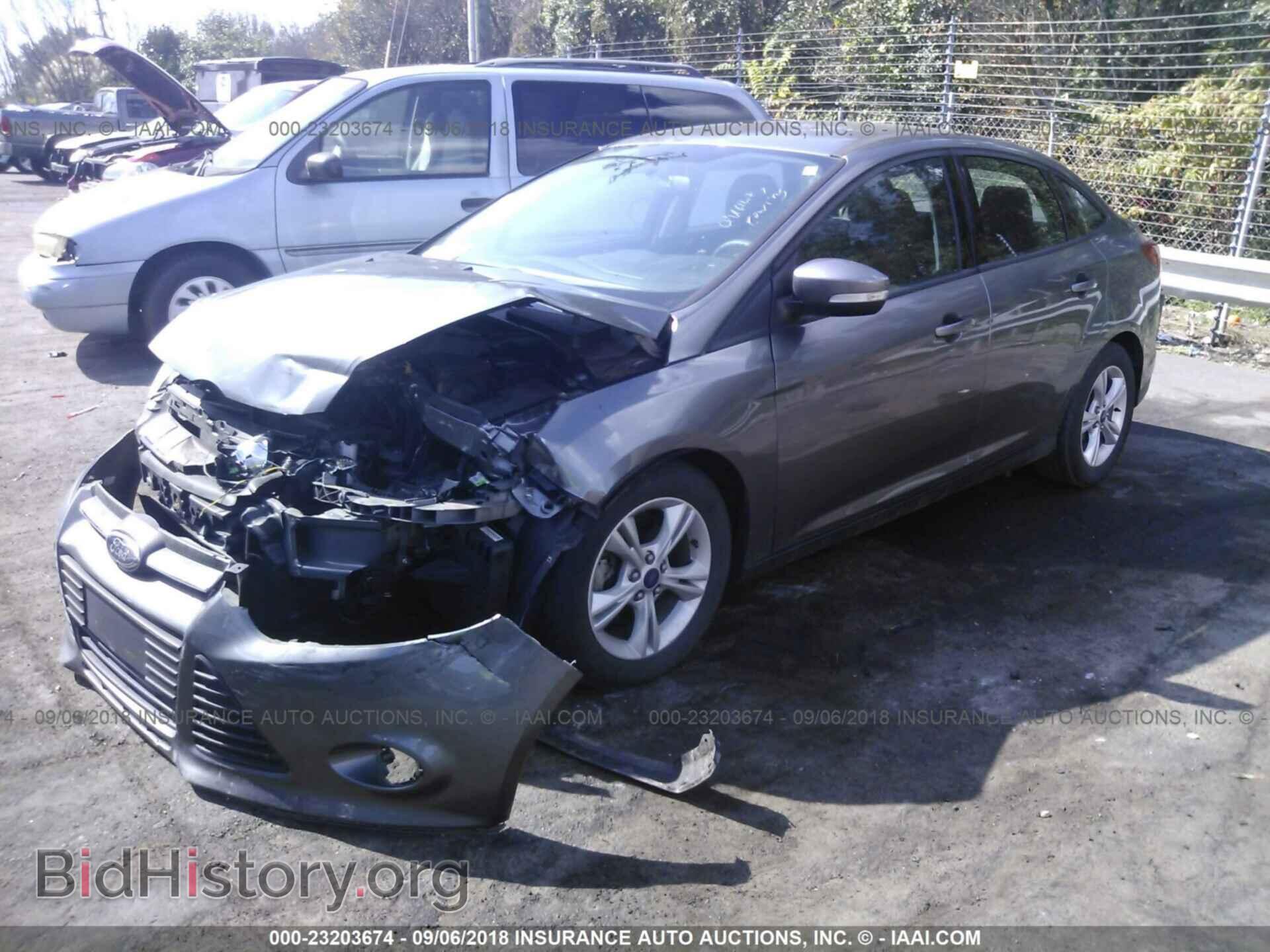 2014 Ford Focus - VIN: 1FADP3F22EL421611 - Photo 2