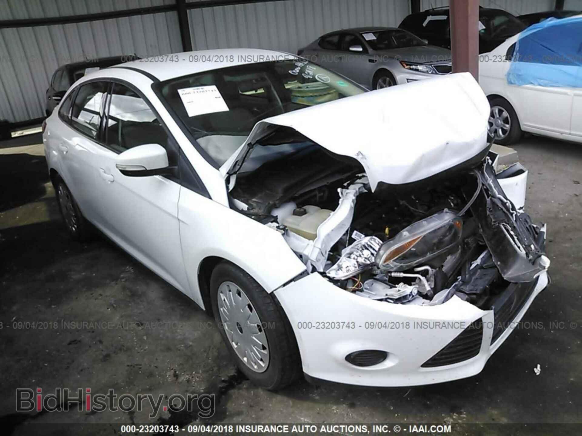 Фотография 1FADP3F25EL431274 - Ford Focus 2014