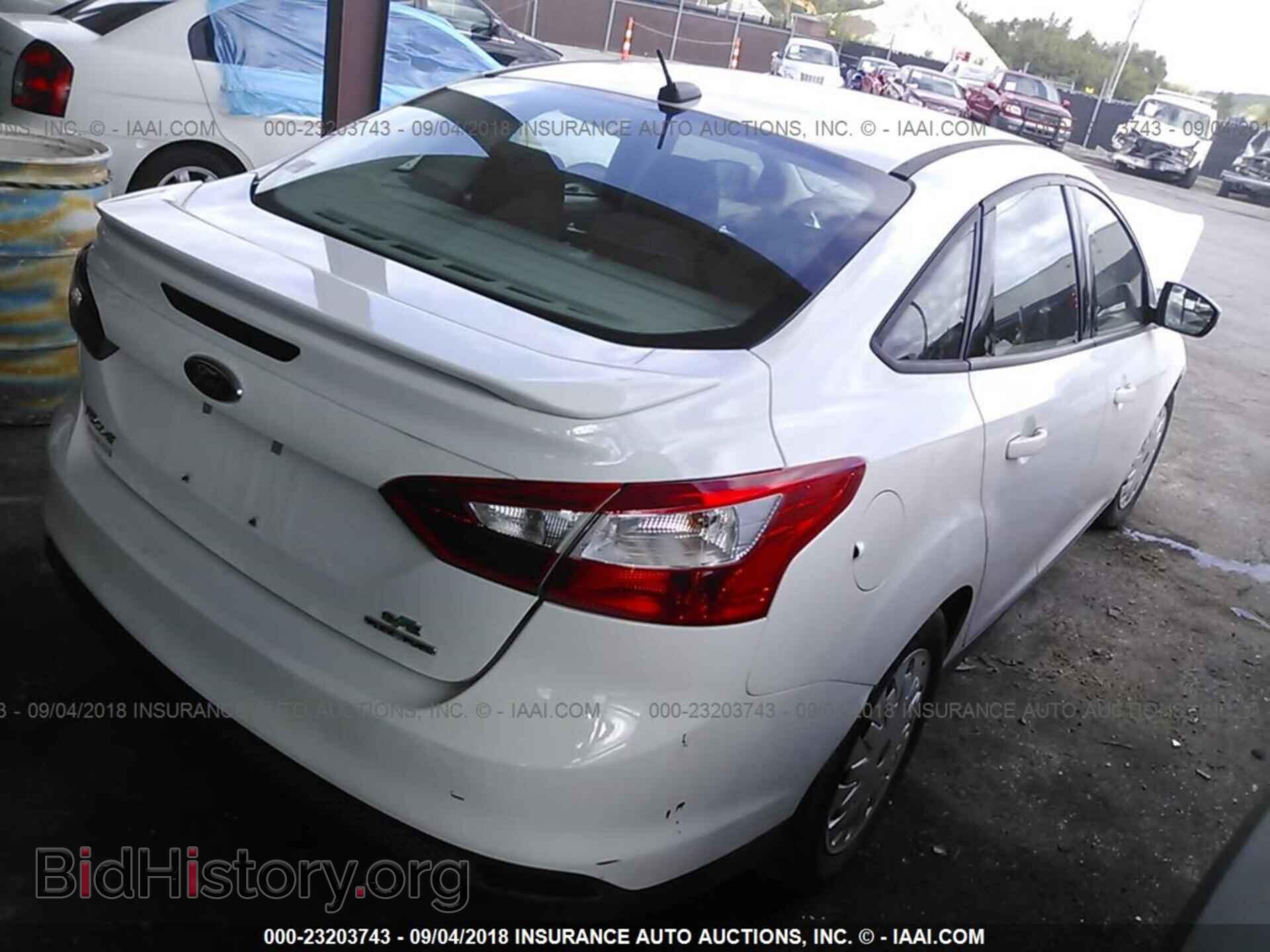 2014 Ford Focus - VIN: 1FADP3F25EL431274 - Фото 4