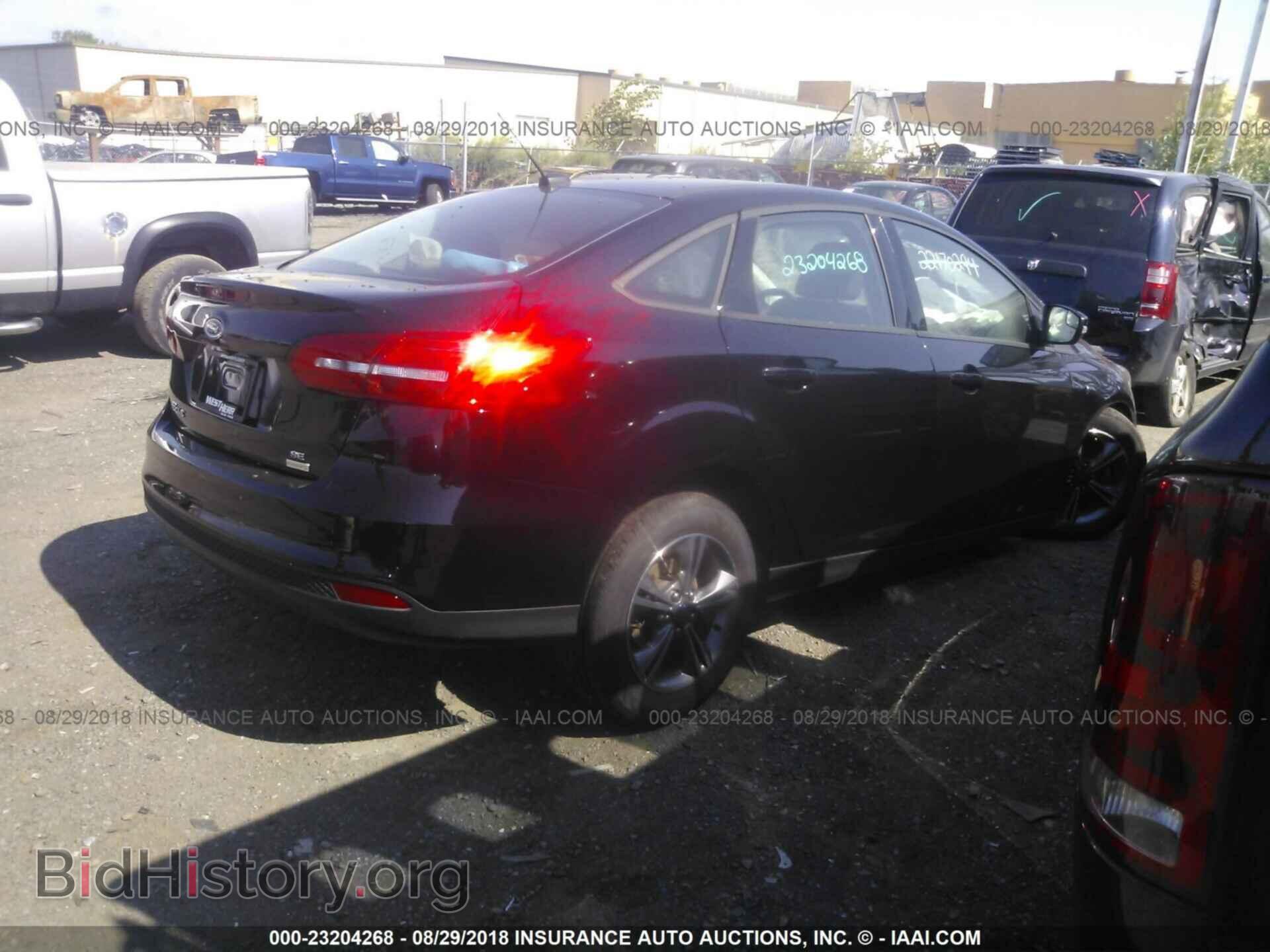 2017 Ford Focus - VIN: 1FADP3FE3HL323587 - Photo 4