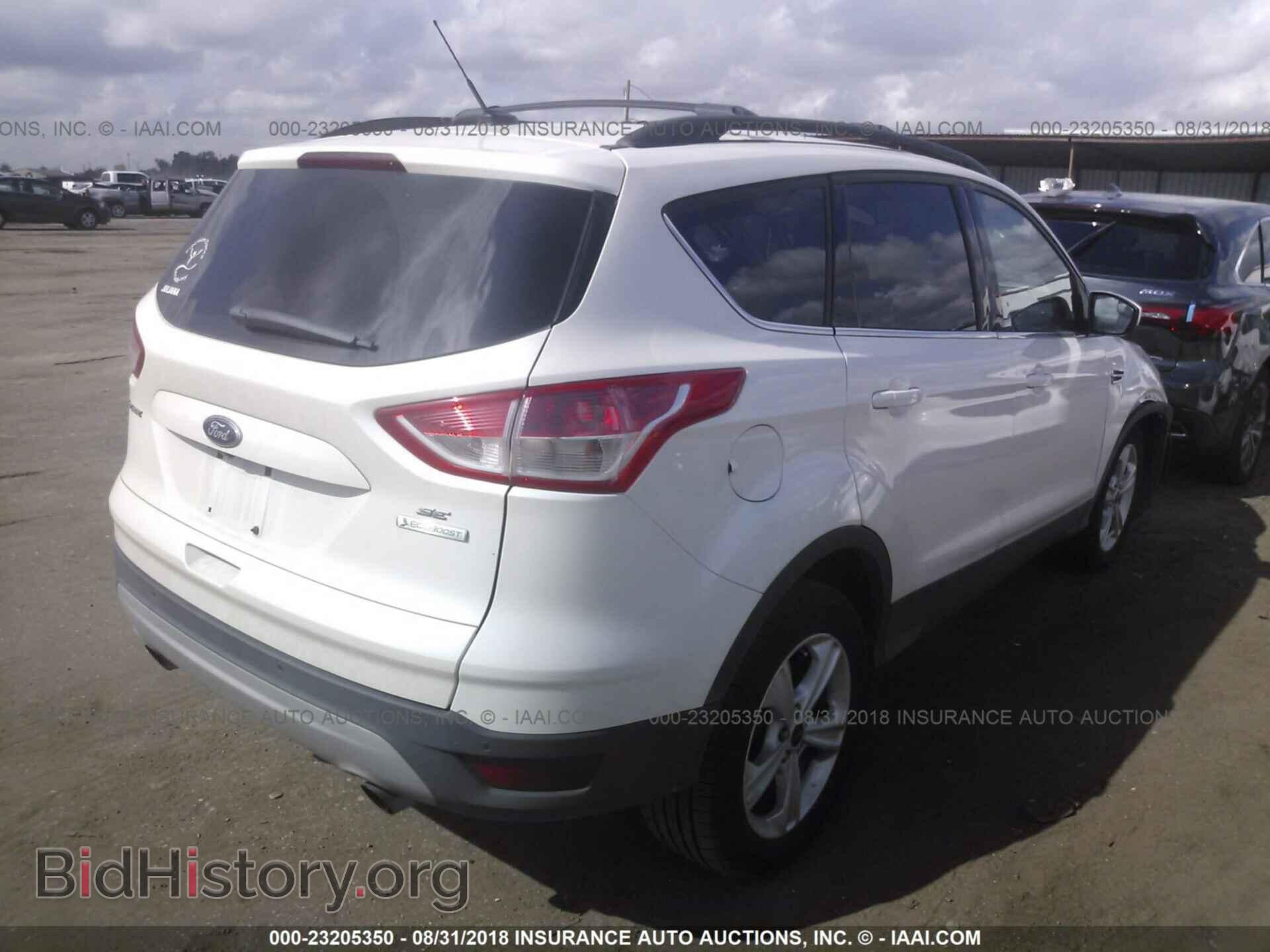 2014 Ford Escape - VIN: 1FMCU0GX9EUB45585 - Photo 4