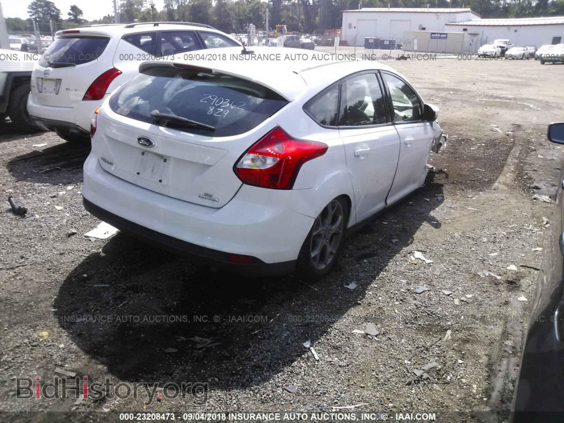 2014 Ford Focus - VIN: 1FADP3K22EL296924 - Фото 4