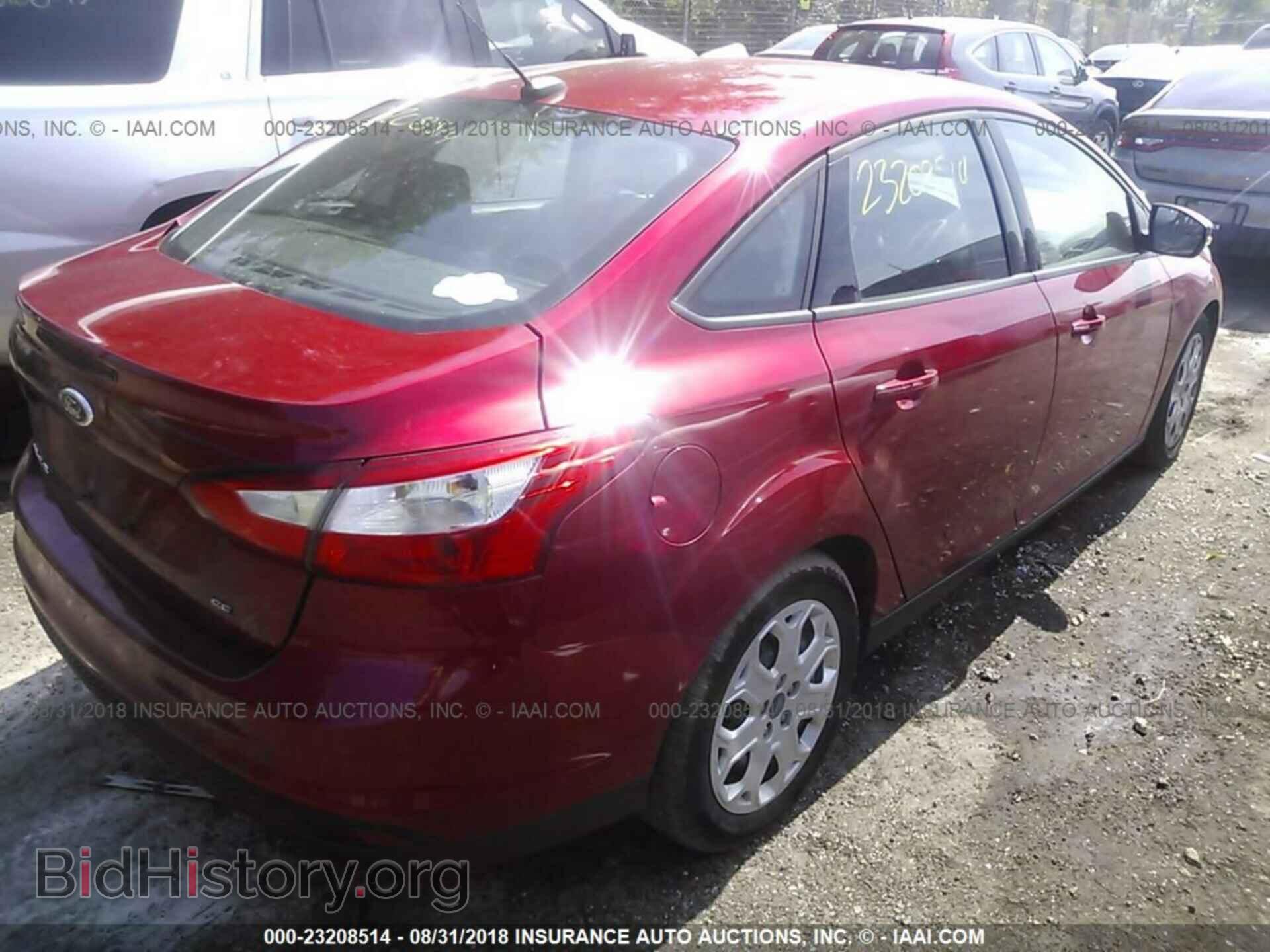 2012 Ford Focus - VIN: 1FAHP3F24CL353584 - Фото 4