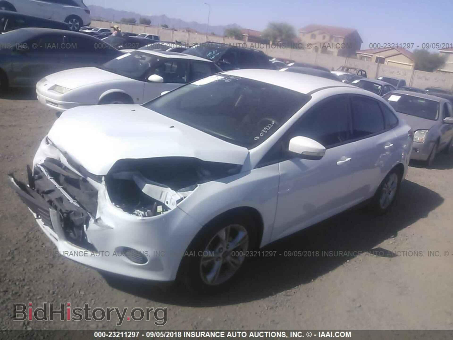 2014 Ford Focus - VIN: 1FADP3F2XEL453710 - Фото 2