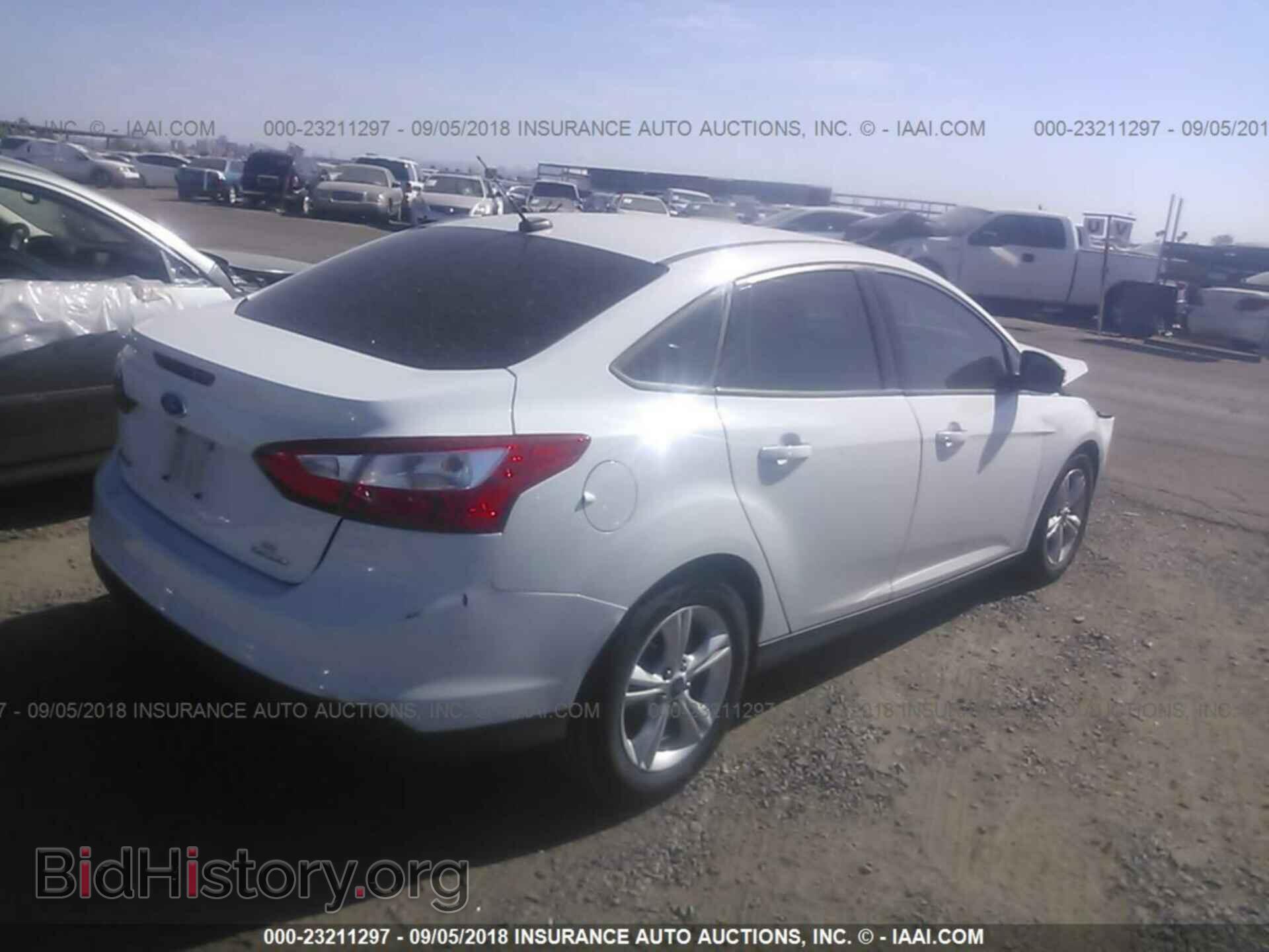 2014 Ford Focus - VIN: 1FADP3F2XEL453710 - Фото 4