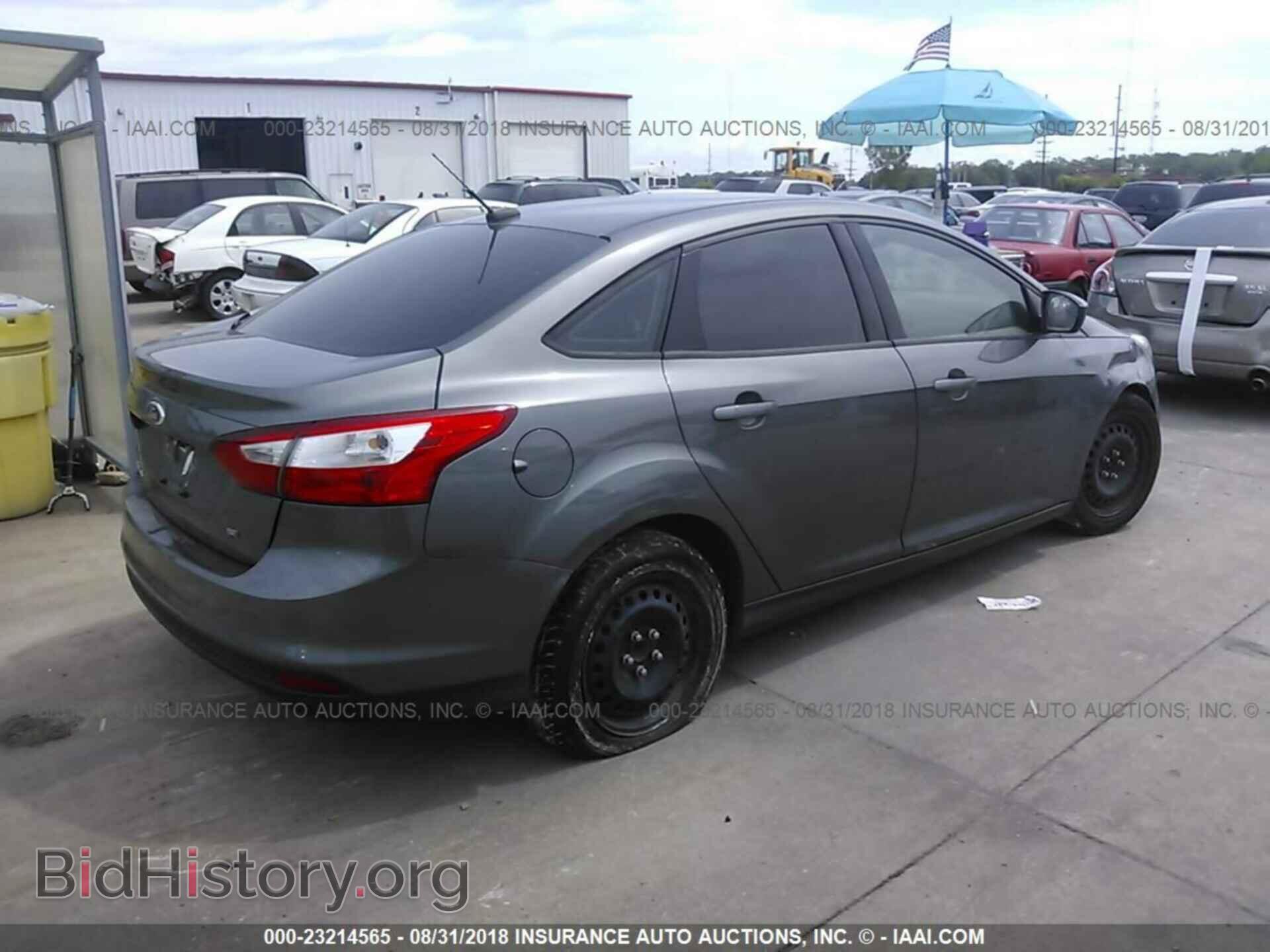 2012 Ford Focus - VIN: 1FAHP3F26CL346491 - Photo 4