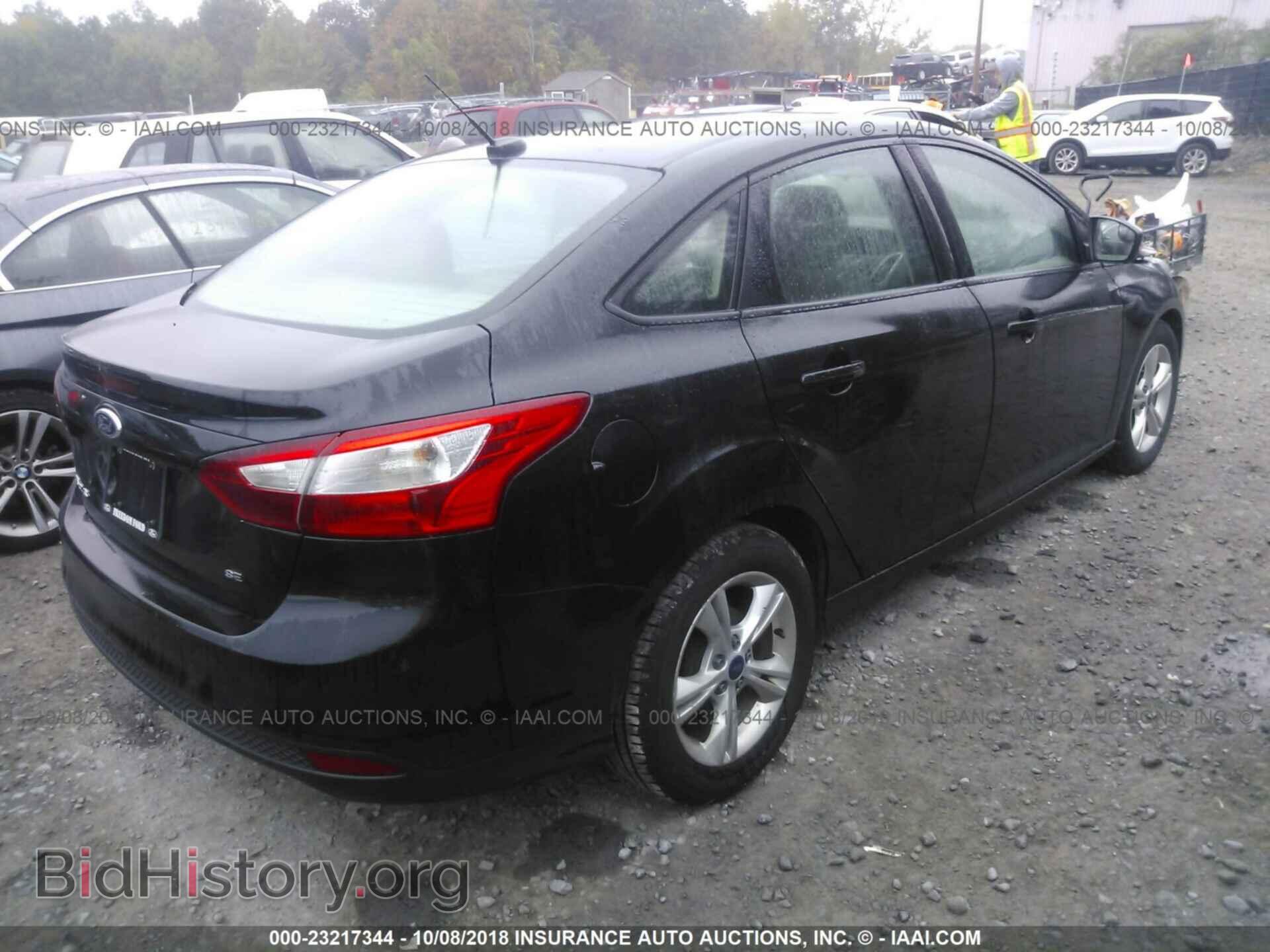 2014 Ford Focus - VIN: 1FADP3F29EL329413 - Фото 4