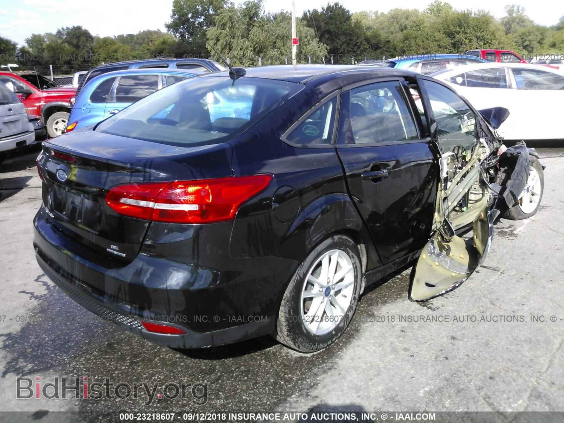 2016 Ford Focus - VIN: 1FADP3F21GL202884 - Photo 4