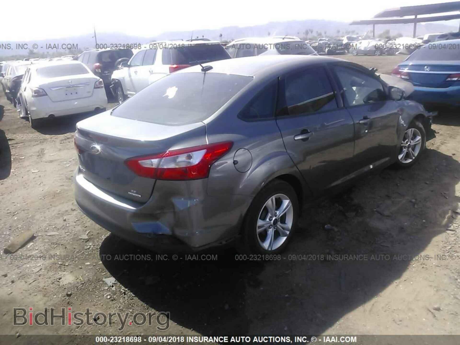 2014 Ford Focus - VIN: 1FADP3F25EL247906 - Photo 4