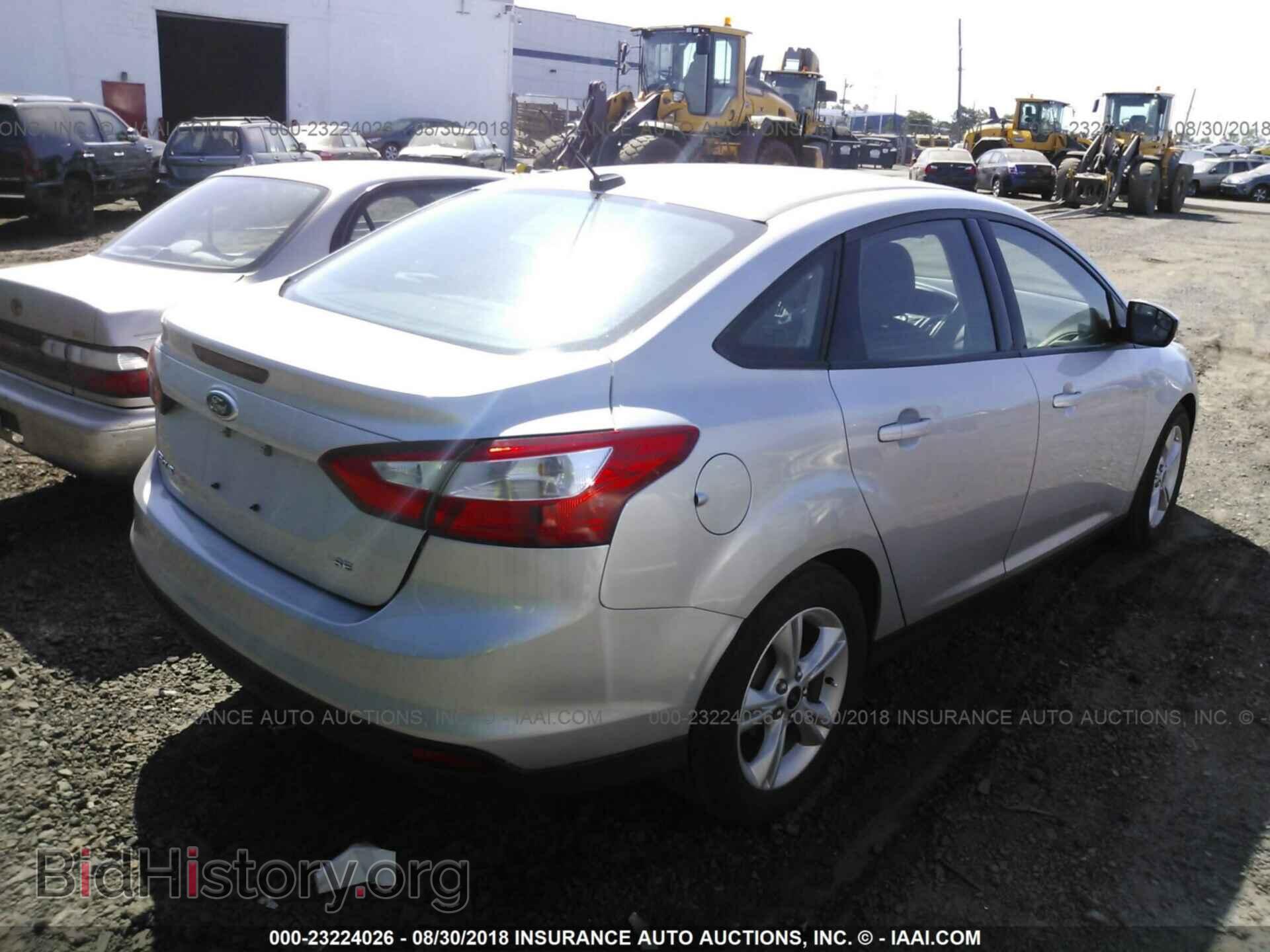 2014 Ford Focus - VIN: 1FADP3F23EL402128 - Фото 4