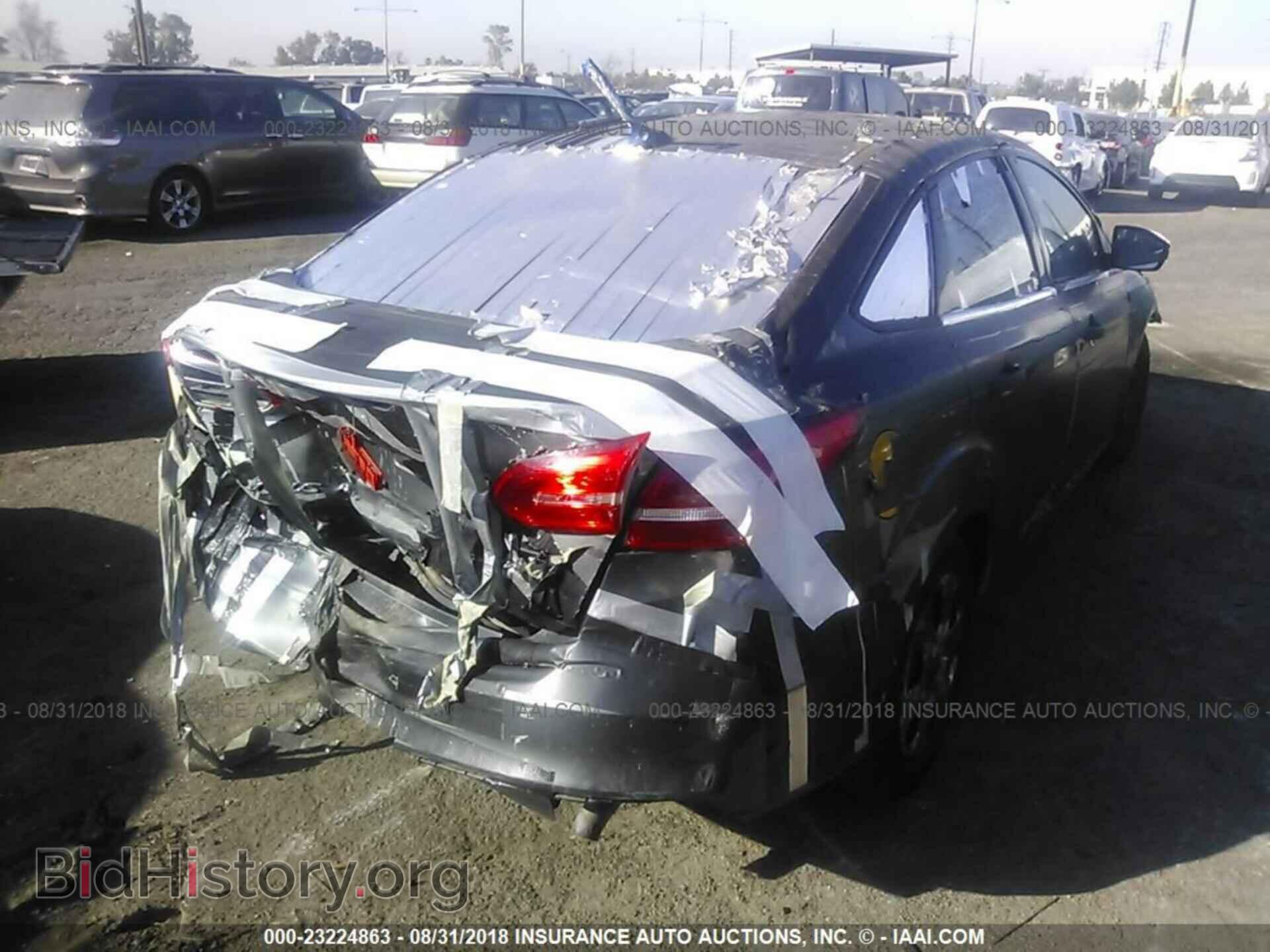 2015 Ford Focus - VIN: 1FADP3E2XFL385783 - Фото 4
