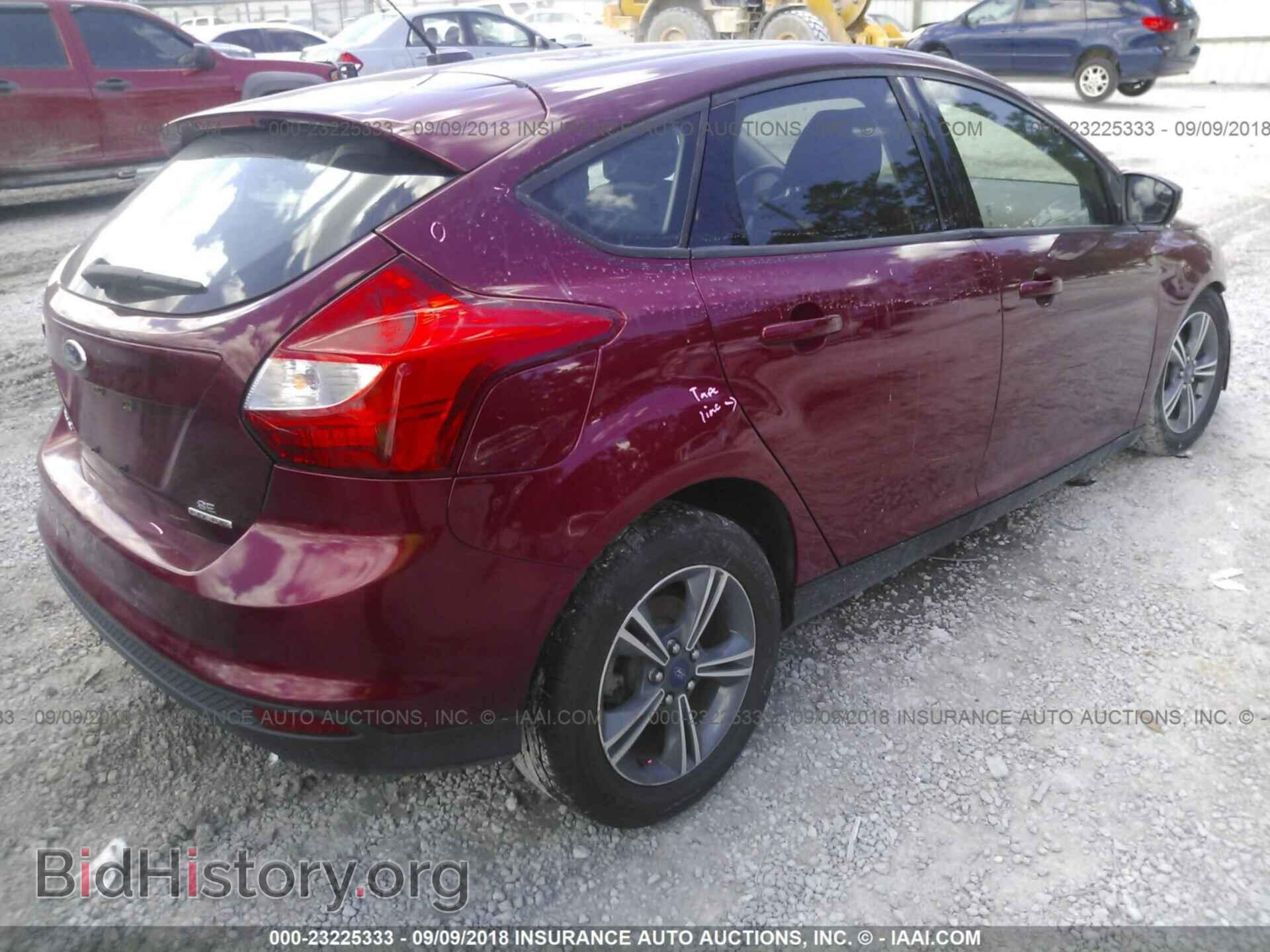 2014 Ford Focus - VIN: 1FADP3K29EL180636 - Photo 4