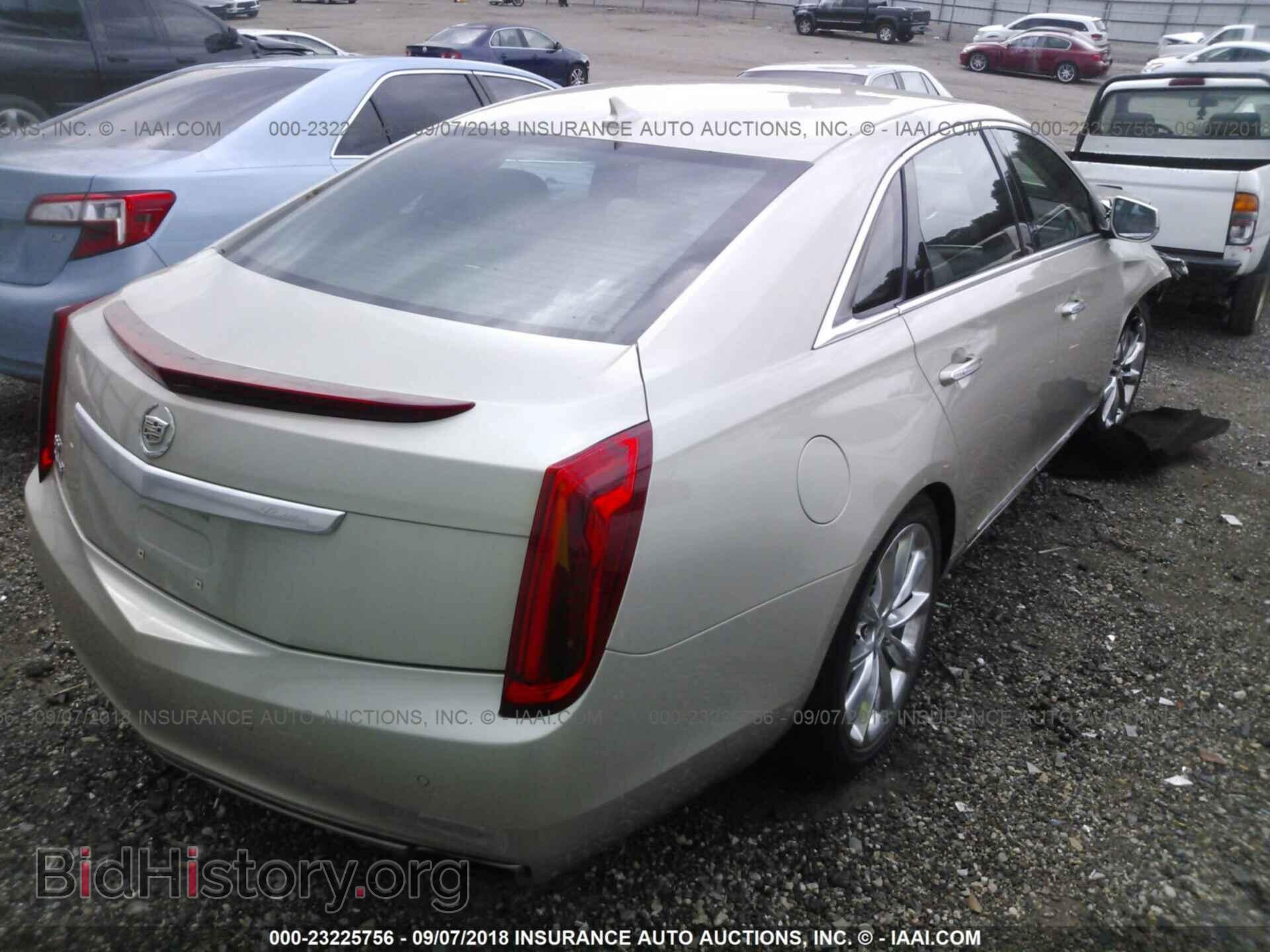 2013 Cadillac Xts - VIN: 2G61P5S34D9218655 - Фото 4