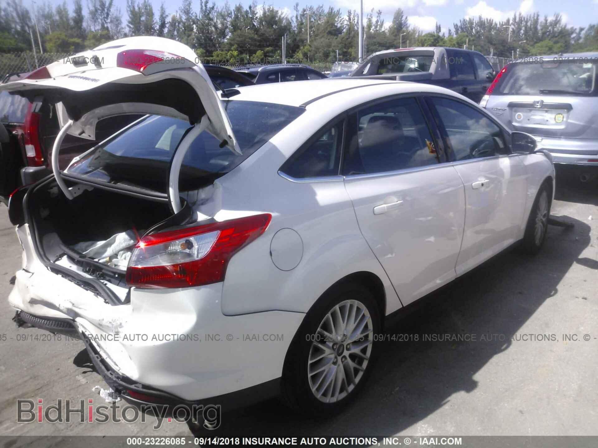 2013 Ford Focus - VIN: 1FADP3J26DL138876 - Photo 4