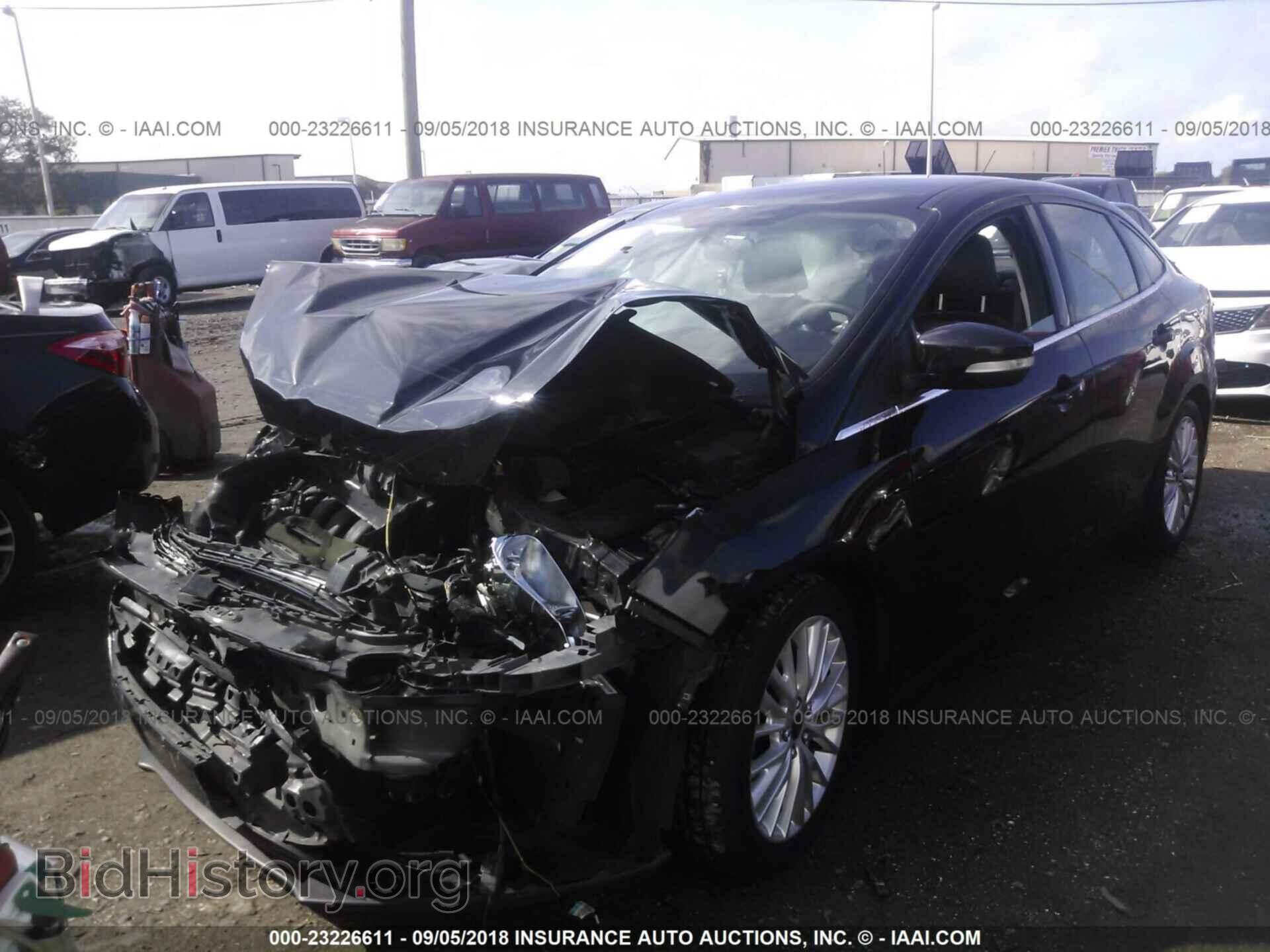 2015 Ford Focus - VIN: 1FADP3J20FL304599 - Photo 2