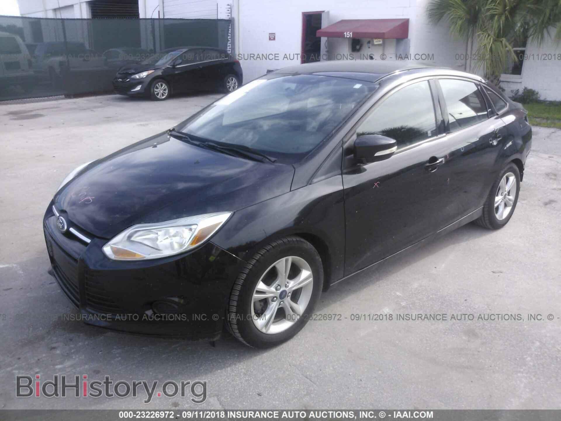 2014 Ford Focus - VIN: 1FADP3F23EL273209 - Фото 2