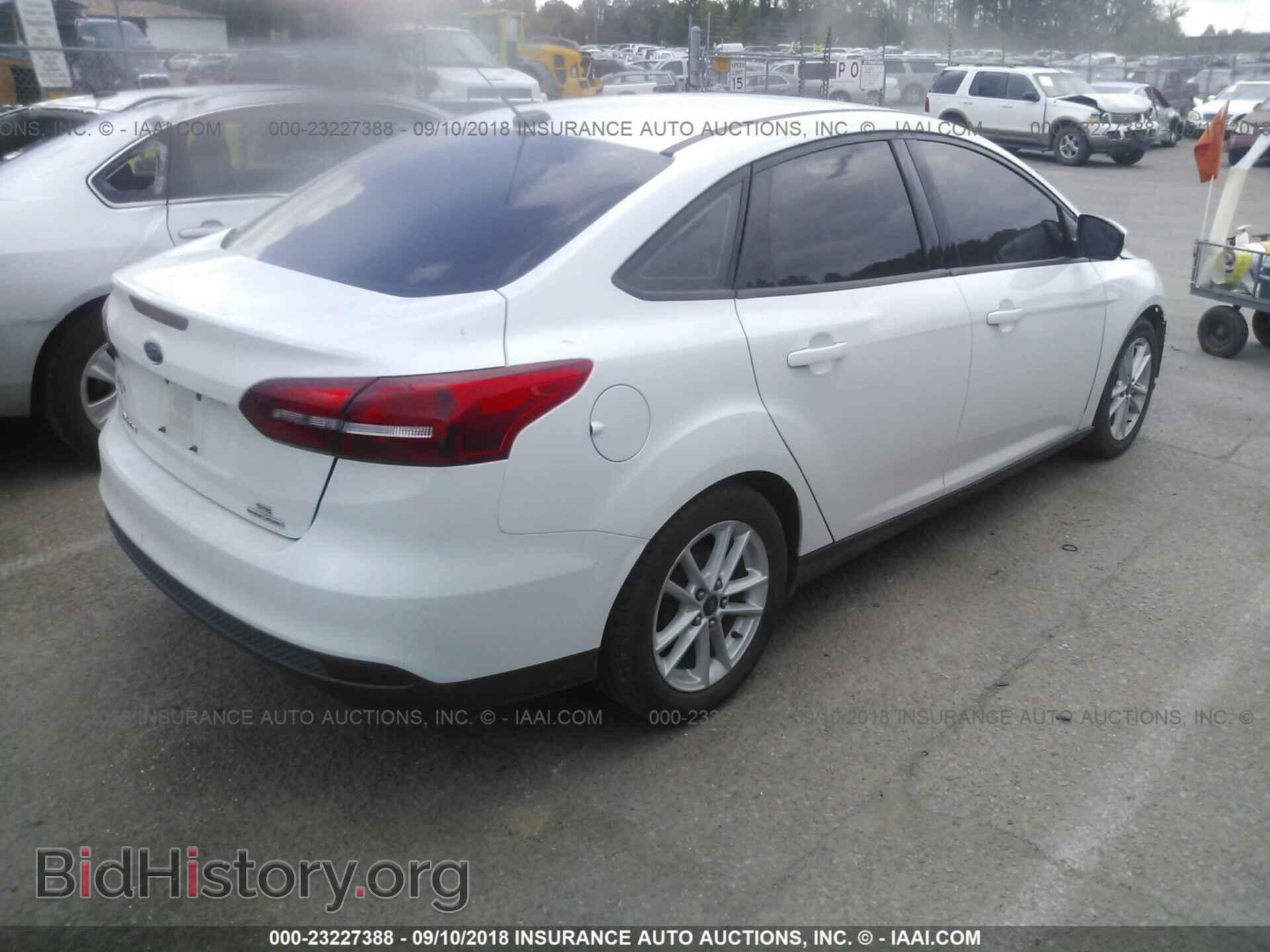 2016 Ford Focus - VIN: 1FADP3F25GL205934 - Photo 4