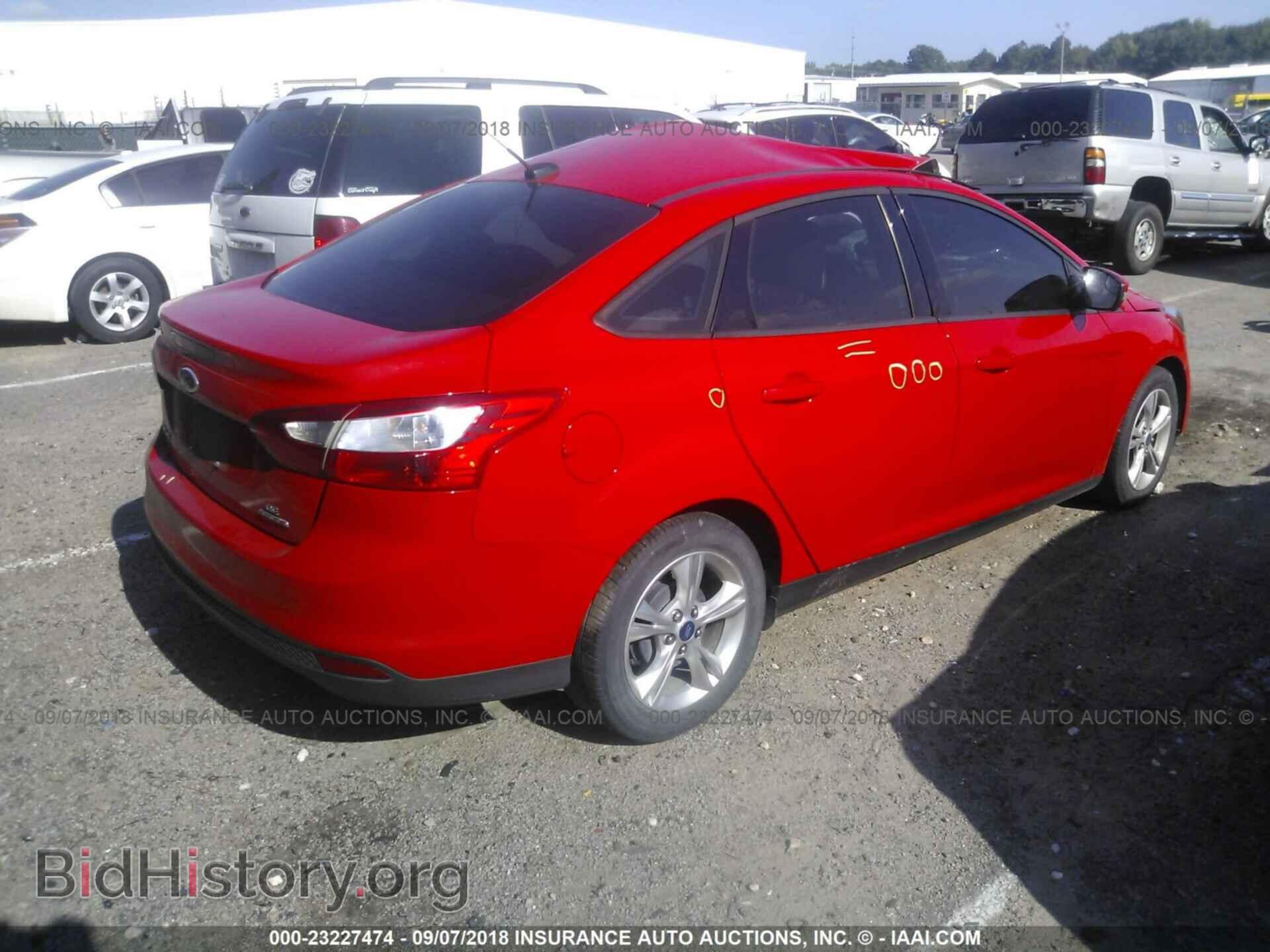 2013 Ford Focus - VIN: 1FADP3F22DL125387 - Фото 4