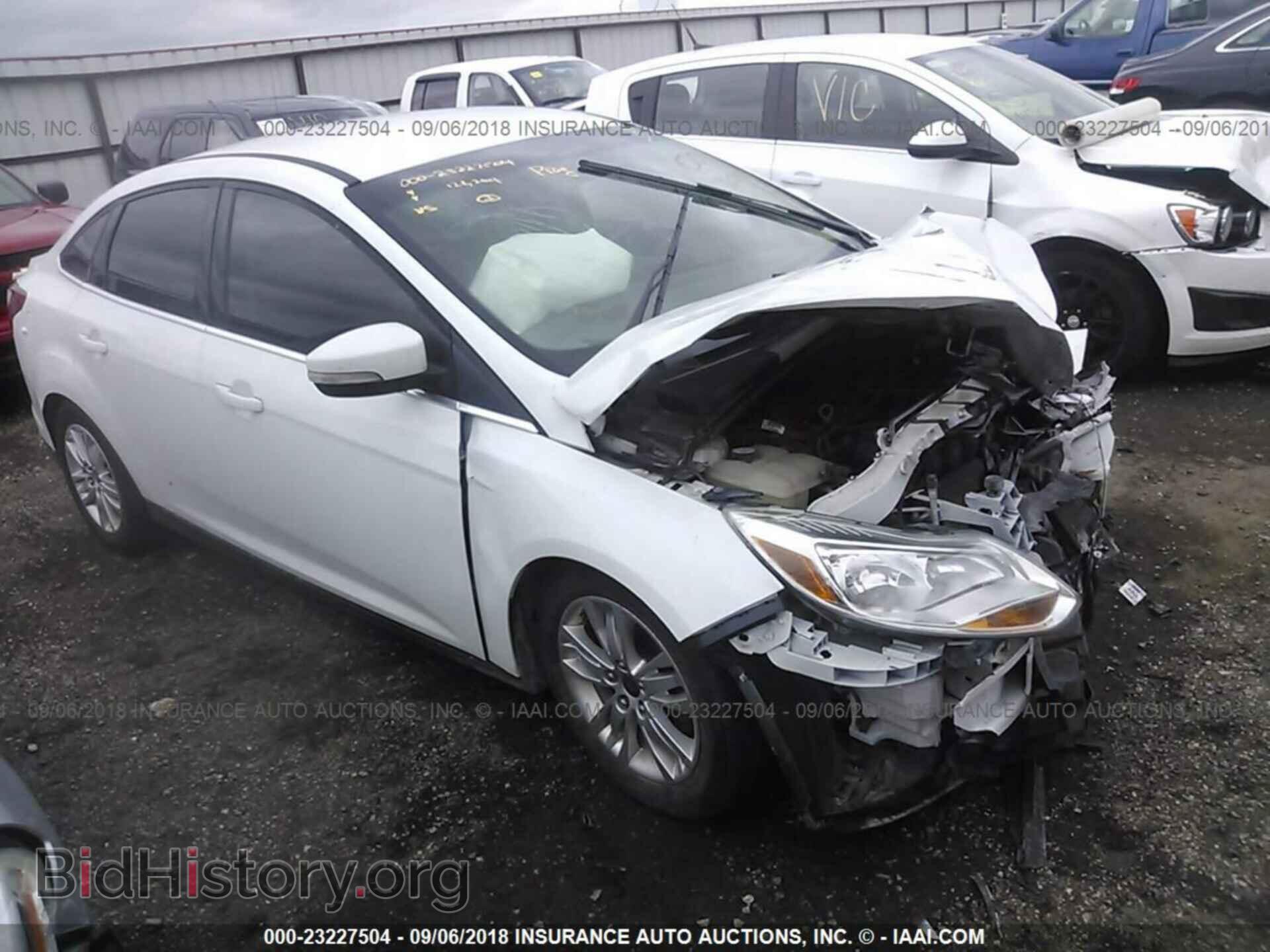 Фотография 1FAHP3H27CL209248 - Ford Focus 2012
