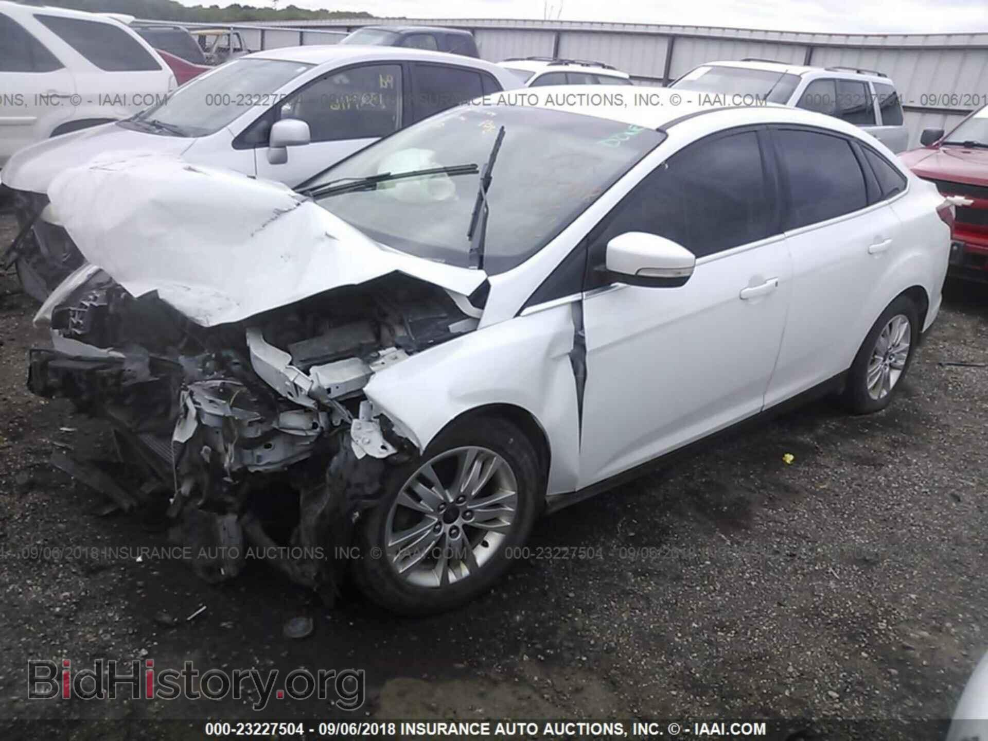 2012 Ford Focus - VIN: 1FAHP3H27CL209248 - Photo 2
