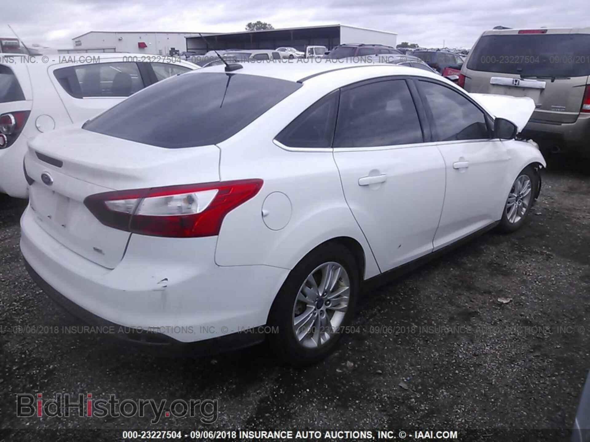 2012 Ford Focus - VIN: 1FAHP3H27CL209248 - Photo 4