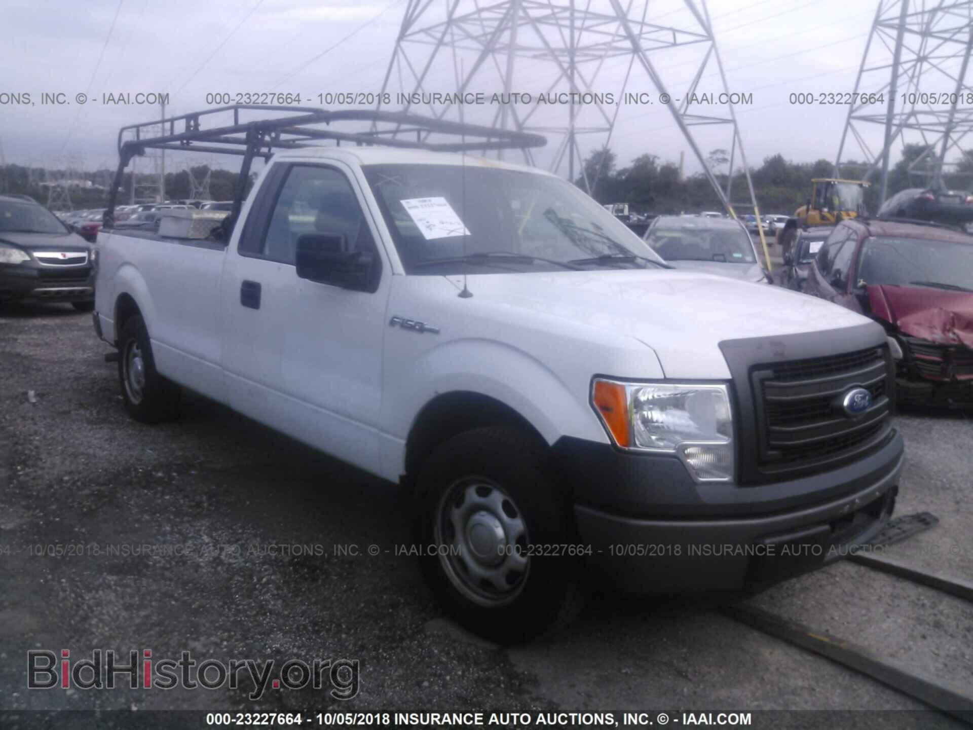 Фотография 1FTMF1CM2EKD49239 - Ford F150 2014