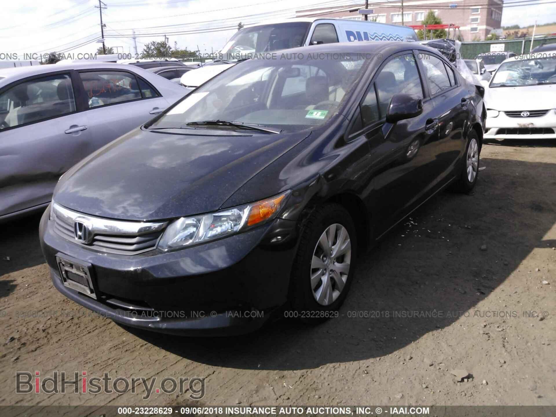 2012 Honda Civic - VIN: 2HGFB2F59CH575122 - Photo 2