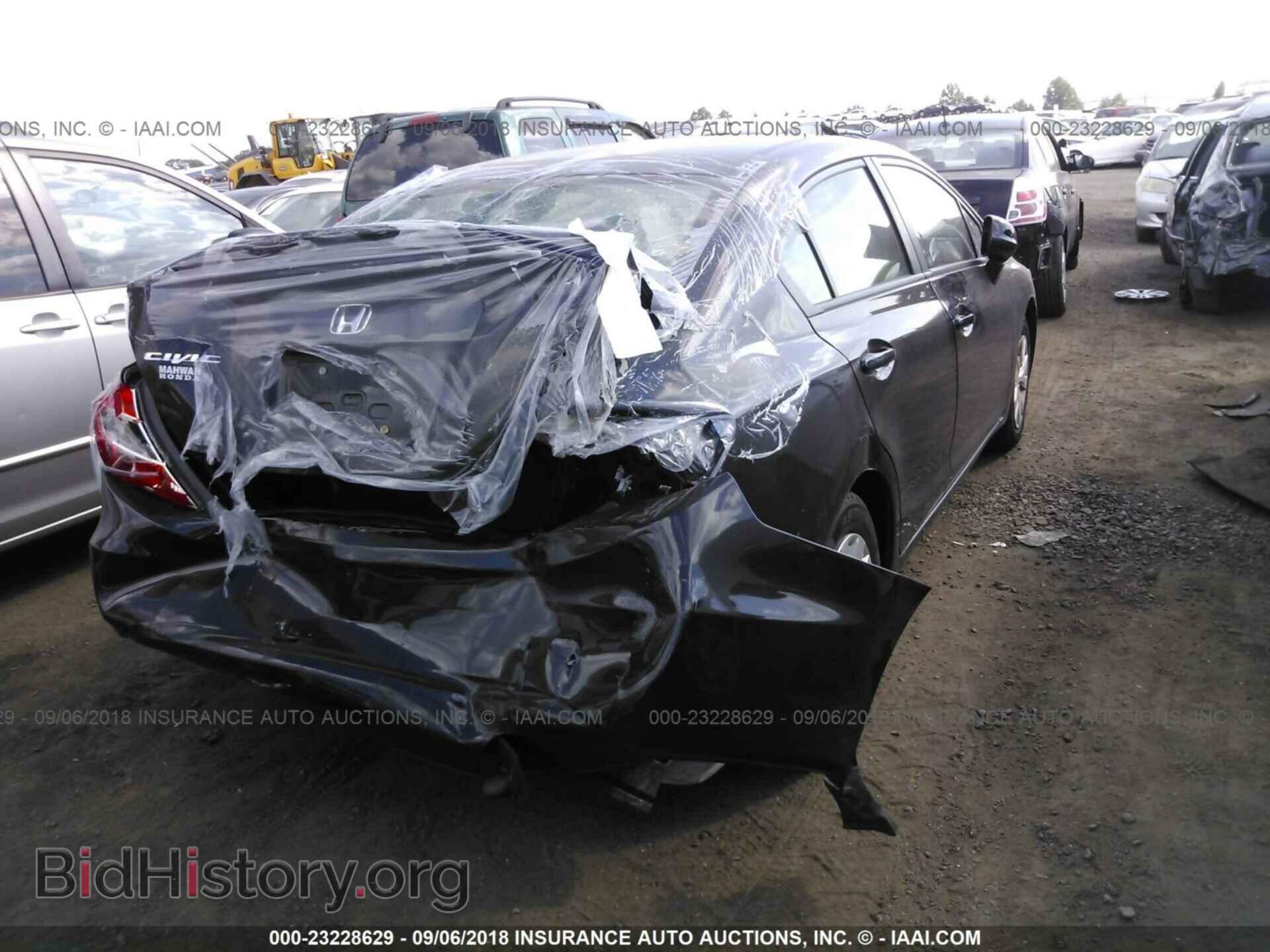 2012 Honda Civic - VIN: 2HGFB2F59CH575122 - Photo 4