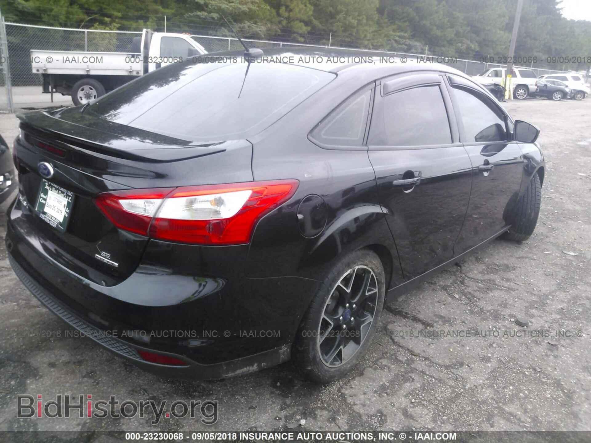 2014 Ford Focus - VIN: 1FADP3F22EL227712 - Фото 4