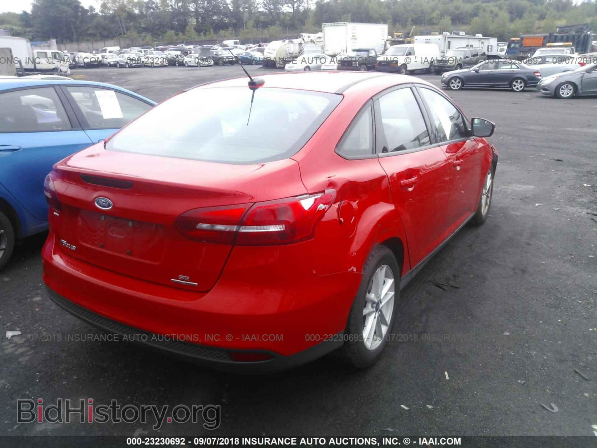 2015 Ford Focus - VIN: 1FADP3F21FL276207 - Photo 4