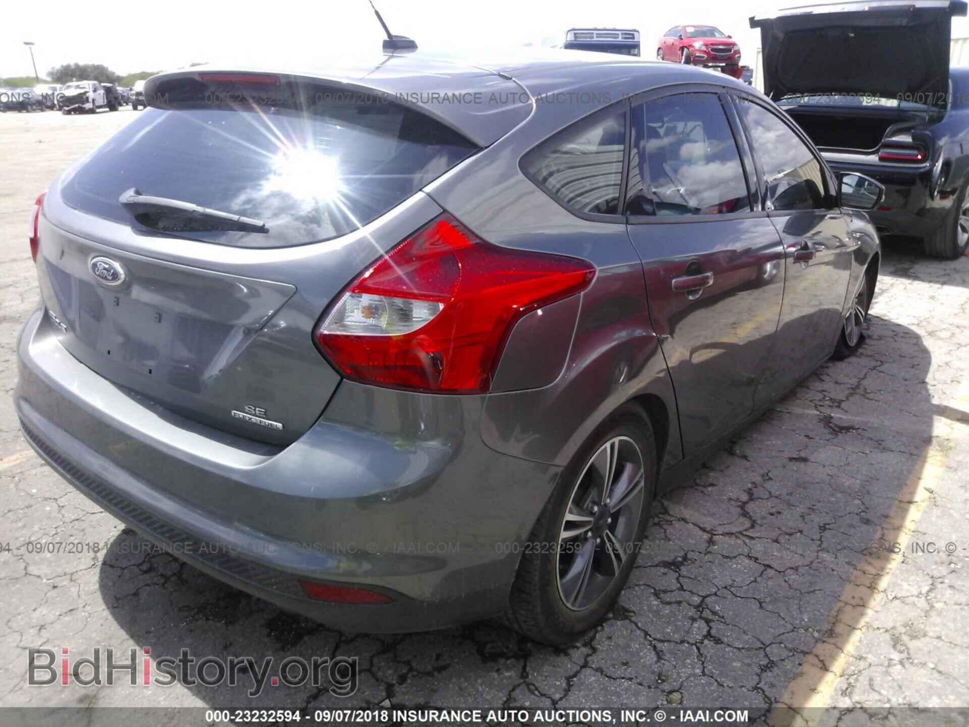 2014 Ford Focus - VIN: 1FADP3K27EL451497 - Фото 4