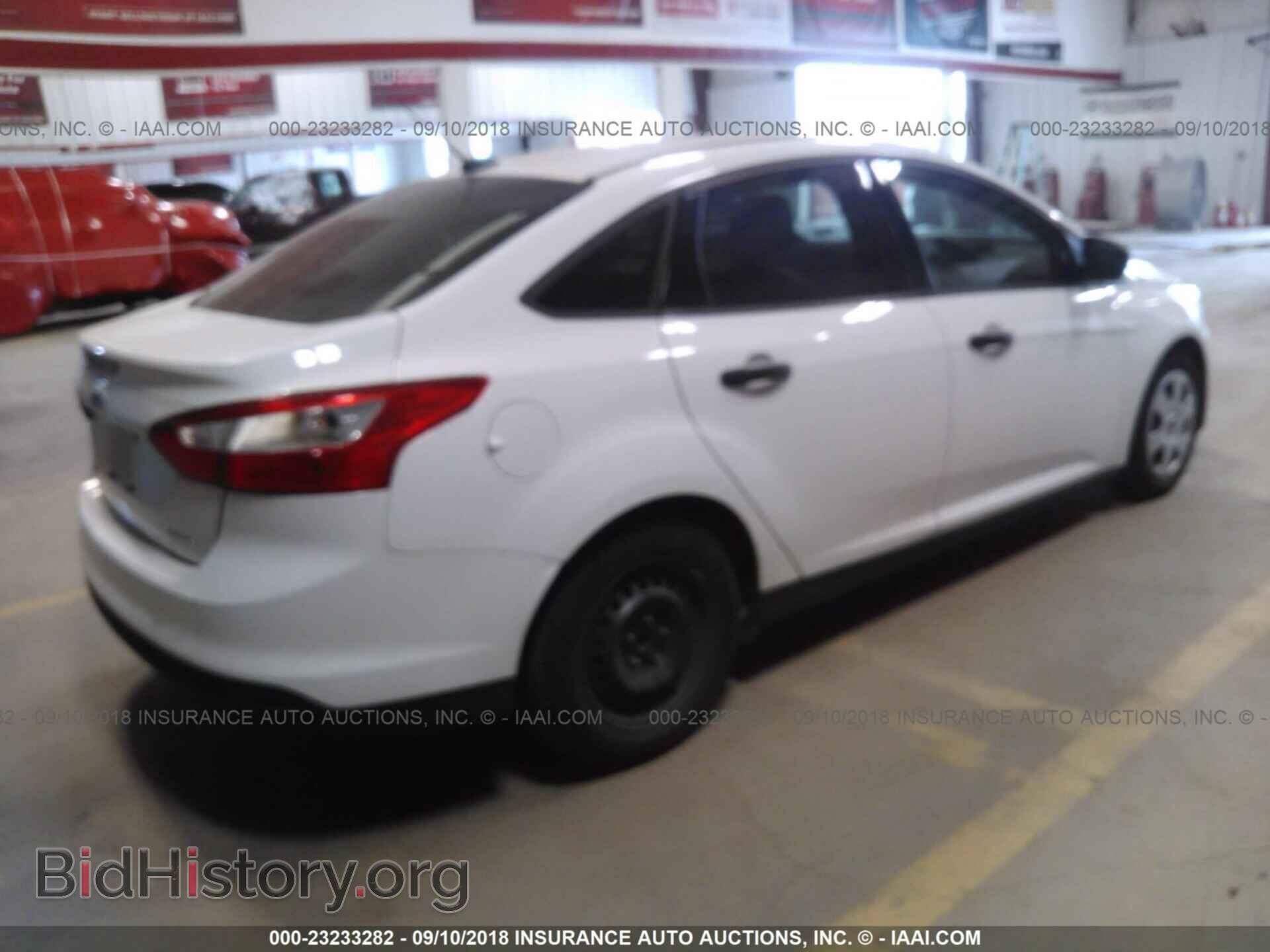 2014 Ford Focus - VIN: 1FADP3E29EL419999 - Фото 4