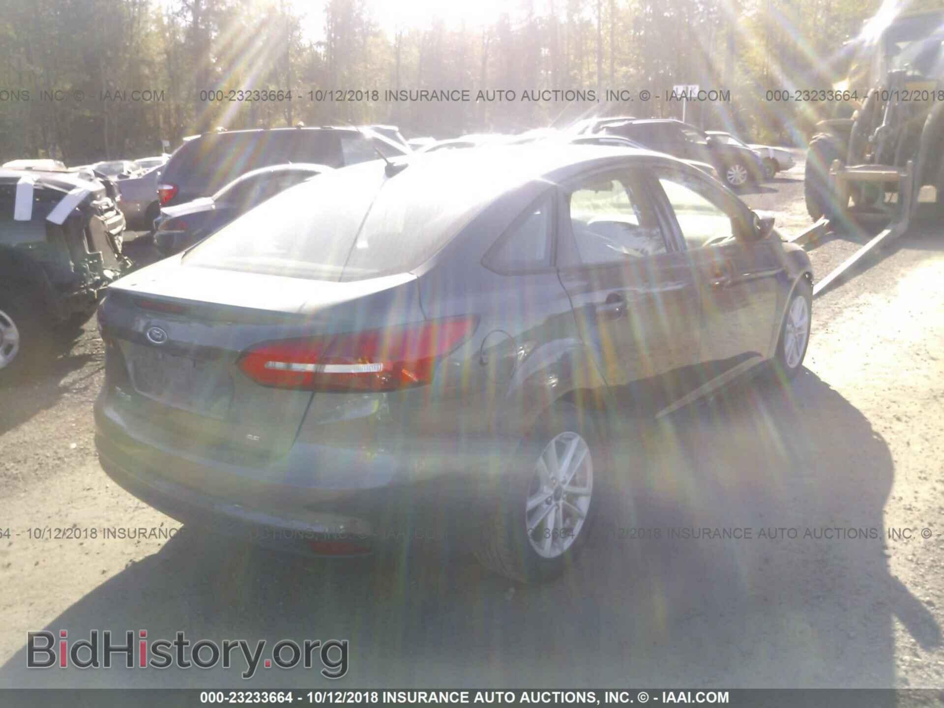 2018 Ford Focus - VIN: 1FADP3F26JL279953 - Фото 4