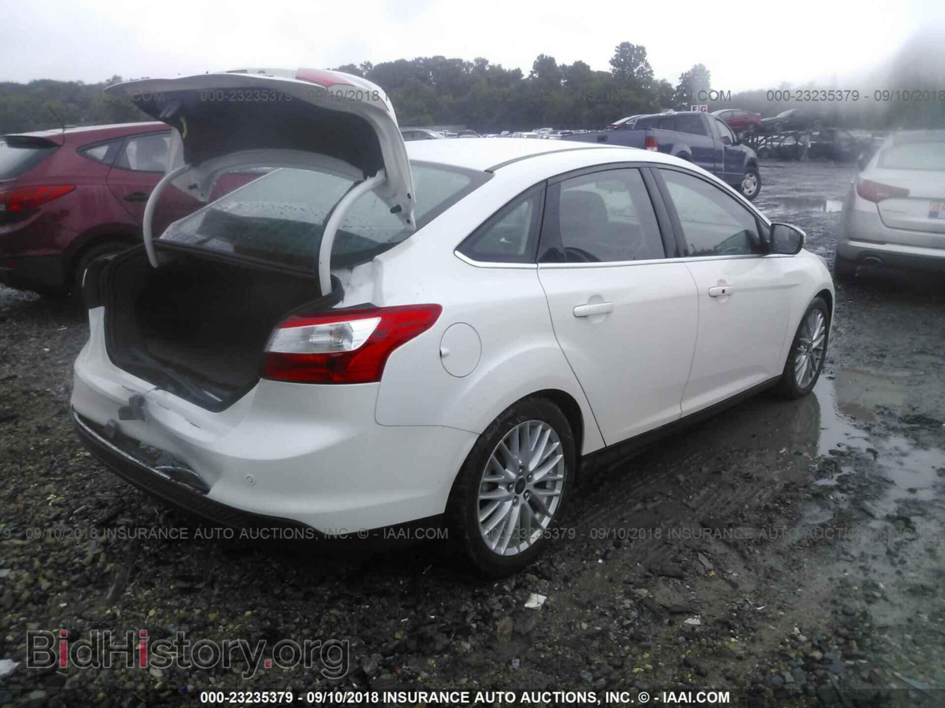 2014 Ford Focus - VIN: 1FADP3J29EL232722 - Фото 4