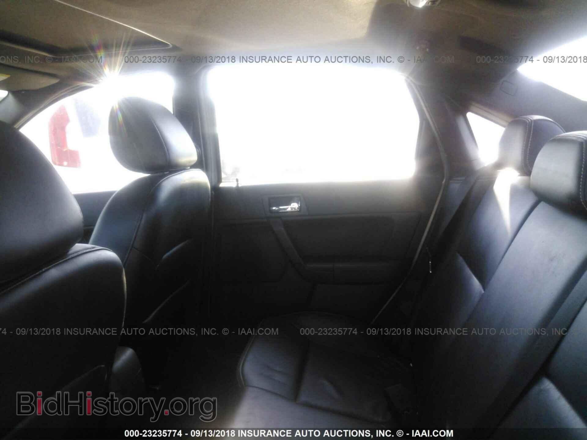 2011 Ford Focus - VIN: 1FAHP3HN6BW205022 - Фото 8