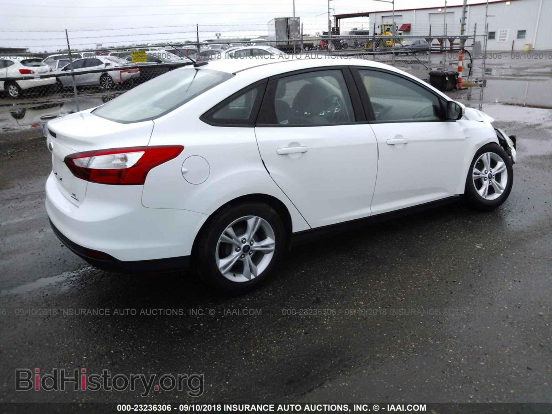 2014 Ford Focus - VIN: 1FADP3F23EL278152 - Photo 4