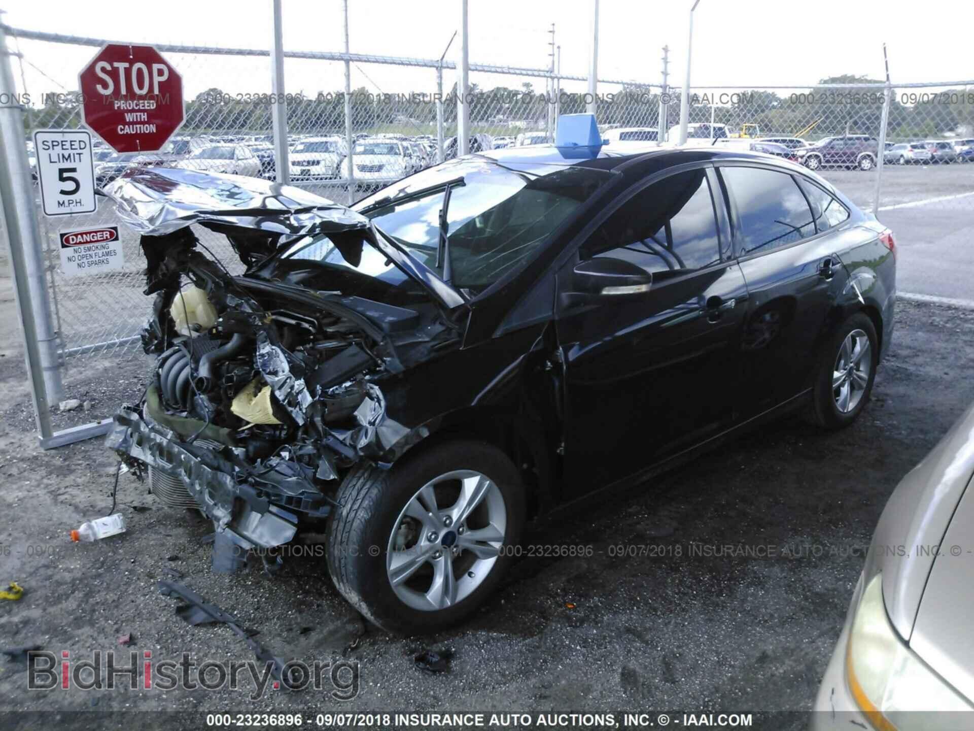 2014 Ford Focus - VIN: 1FADP3F26EL312830 - Фото 2