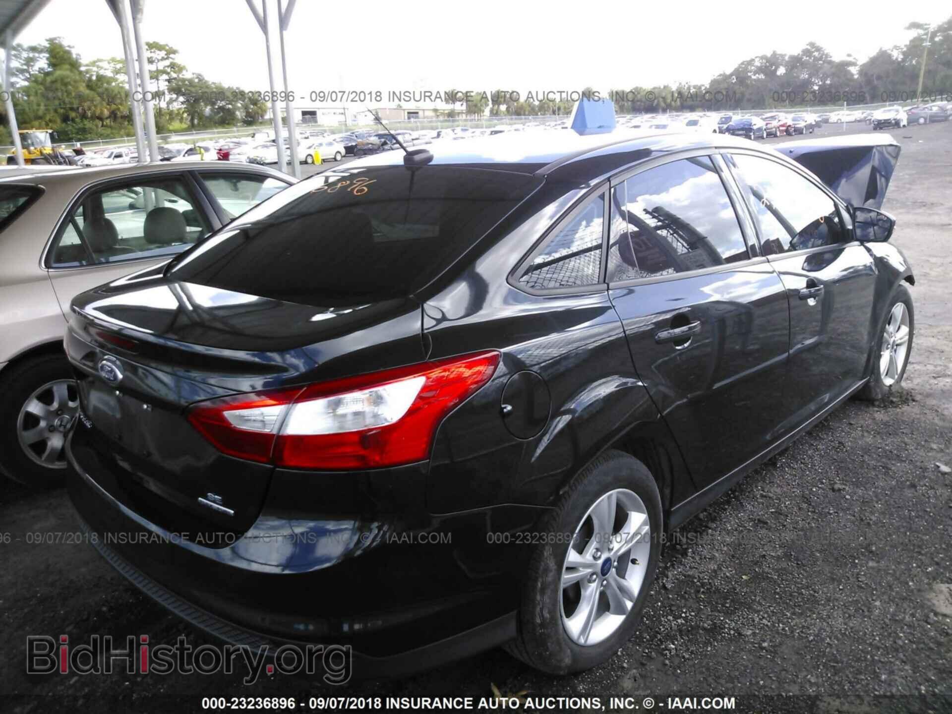 2014 Ford Focus - VIN: 1FADP3F26EL312830 - Фото 4