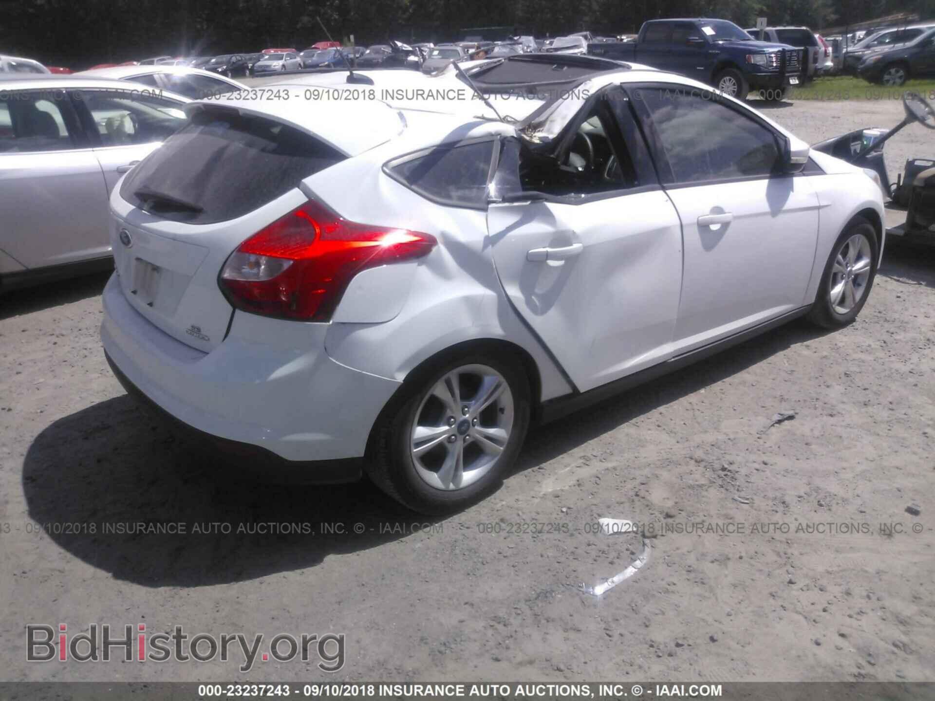 2014 Ford Focus - VIN: 1FADP3K20EL203351 - Фото 4
