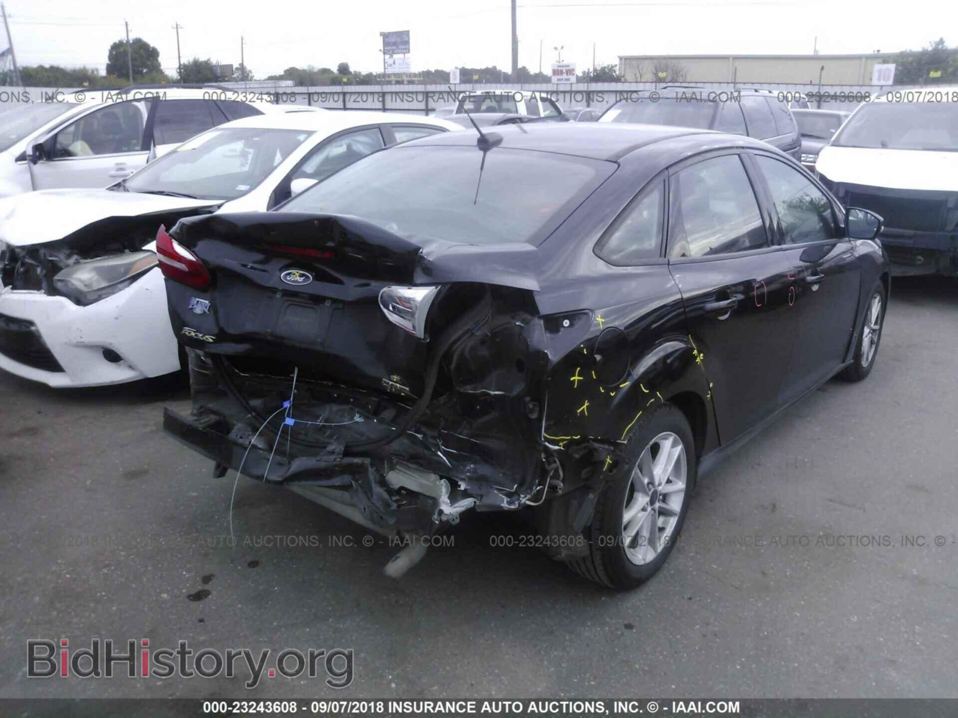 2016 Ford Focus - VIN: 1FADP3F21GL262437 - Photo 4